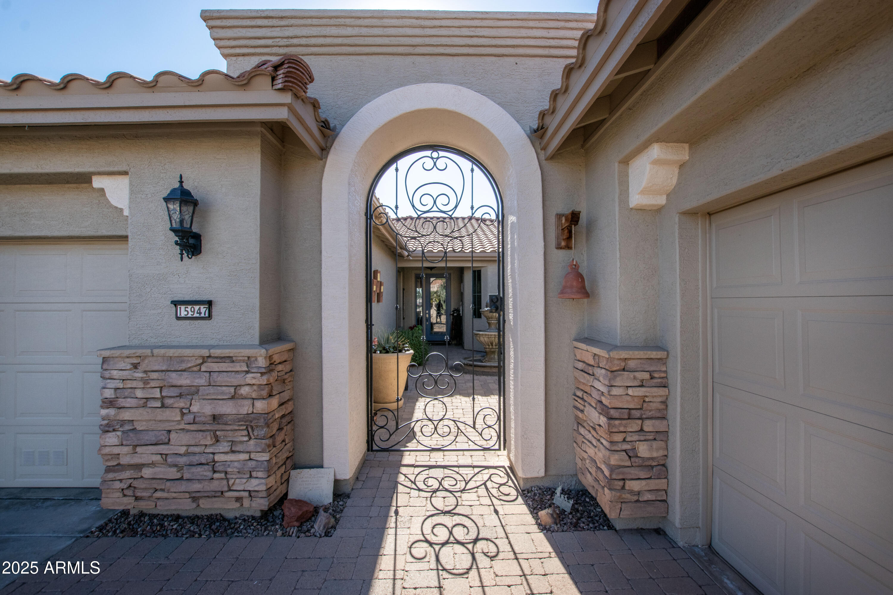 Exquisite Sienna Model Golf Course Residence w/ Casita & Owned Solar
Experience luxury living in this beautifully appointed Sienna model home, ideally situated on the golf course w/ sweeping panoramic views of the lush fairways & majestic mountains. This 3-bed, 3-bath property includes a desirable separate casita w/ full bathroom—perfect for guests, in-laws, or a private retreat.
Enter through a charming front courtyard featuring a tranquil fountain and elegant pavers. Crown molding graces every room in the main home and casita, adding timeless sophistication.
The gourmet kitchen is a chef's dream: Wolf & Sub-Zero appliances, custom-built island, built-in wine cooler fridge, spacious pantry, skylight, pull-out shelves, reverse osmosis system, new dishwasher, breakfast bar & cozy... dining nook.
Adjacent great room impresses with coffered ceilings and custom built-in entertainment center. The master suite offers direct patio access, an updated zero-grade entry walk-in shower, and a customized "dream" closet complete with its own island.
A dedicated den/office features built-in shelves with lighting and a generous desk. The travertine stone patio is an outdoor paradise: sparkling small pool, built-in BBQ, fire pit, ceiling fans and the middle pillar has been removed for completely unobstructed golf course and mountain views.
Additional highlights: full 3-car garage with storage cabinets, owned solar panels (dramatically low electric bills), updated HVAC (2021), new hot water heater, and pool pump/filter.
This move-in-ready gem blends elegance, comfort, and efficiency your desert oasis awaits!