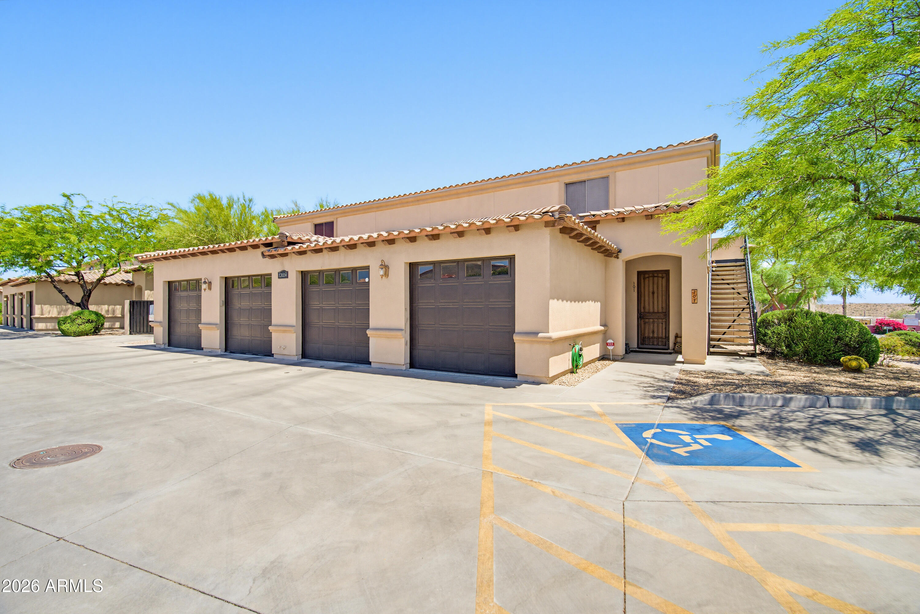 WOW! Freshly painted 2 bed, 2 bath upstairs end-unit condo with stunning mountain views and a direct view of the iconic Fountain Hills fountain from the private balcony! This light and bright split floorplan features soaring ceilings, massive living space, an open concept kitchen overlooking the main living area, and a HUGE walk-in pantry that is hard to find in condo living. Designed to live comfortably like a home, this unit also includes upgraded stainless steel appliances, washer and dryer, RO system, and water softener for added convenience. Both bedrooms offer walk-in closets, including a generously sized primary suite. Ideally located in the heart of Fountain Hills just minutes from Fountain Park, shopping, dining, hiking trails, and entertainment, with quick access to Shea Blvd and SR87 for an easy commute around the Valley. The property also includes a detached 1-car garage, and flooring throughout has been professionally deep cleaned and refreshed for its next resident.