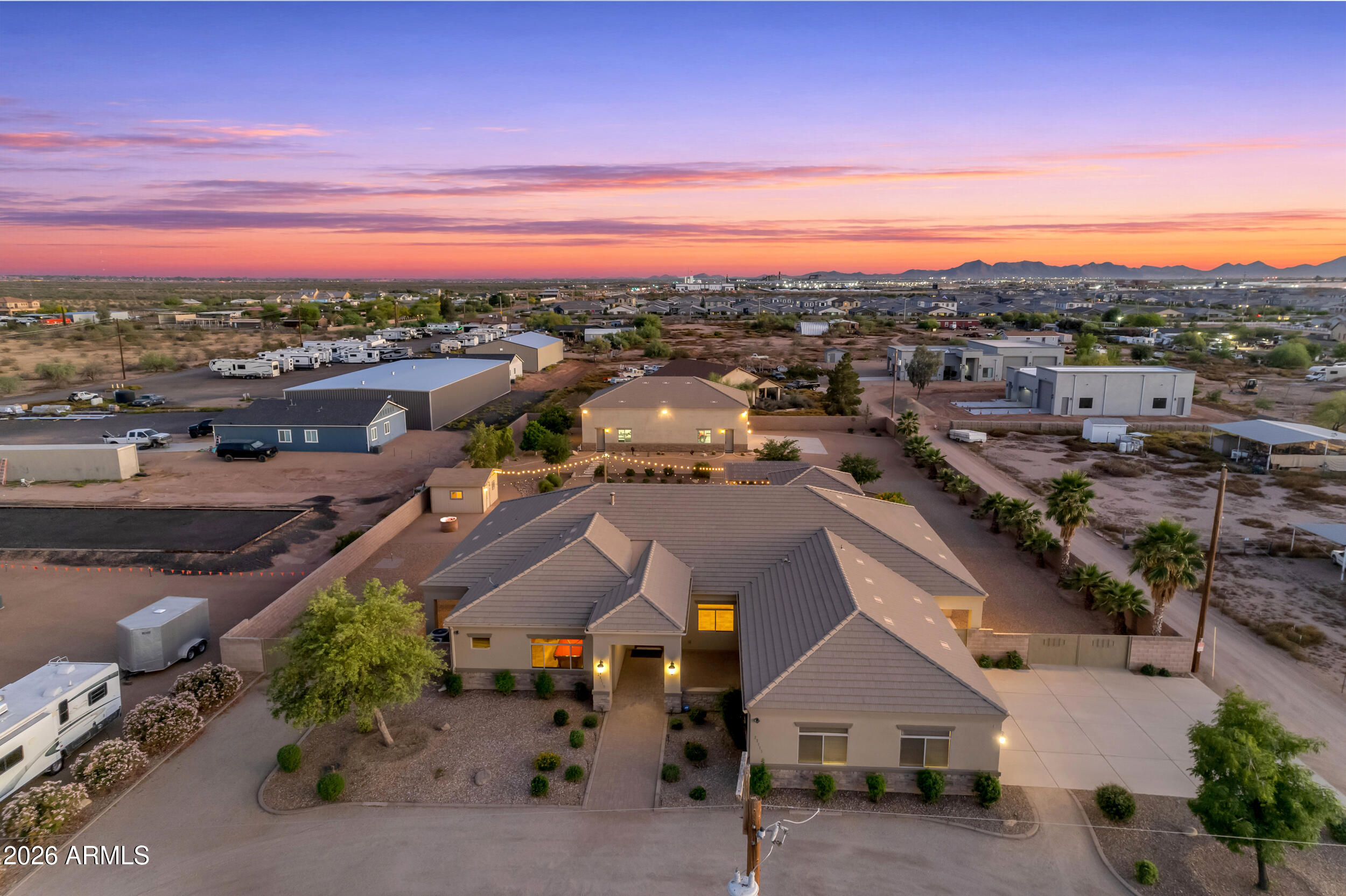 Stunning Custom Home with Expansive Shop & Entertainer's Backyard - No HOA!
Welcome to this beautifully designed custom home featuring a spacious open floor plan and desirable split layout. The inviting great room flows seamlessly into the eat-in kitchen. A large game room and formal dining area offer added versatility for gatherings. Chiseled Travertine Floors in all main areas and Surround Sound through out the home.
Car enthusiasts and hobbyists will appreciate the attached extended-length 3-car garage, while the impressive 2,400 sq ft detached shop is a true standout--offering ample space for boats, RVs, large trucks, or workshop needs.
Located on County Island. The backyard is an entertainer's dream, complete with two BBQ's  expansive counter tops with Tables built-In for entertain Multiple covered patios, and pergolas. A wraparound patio extends along three sides of the home, allowing you to take in breathtaking sunrises and sunsets with mountain views. Gather around the outdoor propane fire pit 
Shared well and septic system
Solid 6" block perimeter fencing for privacy
Low-maintenance custom landscaping with mature fruit trees
Three large RV gates for easy access and storage
Beautiful chiseled travertine flooring throughout main living areas
This one-of-a-kind property combines comfort, space, and flexibility--perfect for those seeking room to live, work, and play.