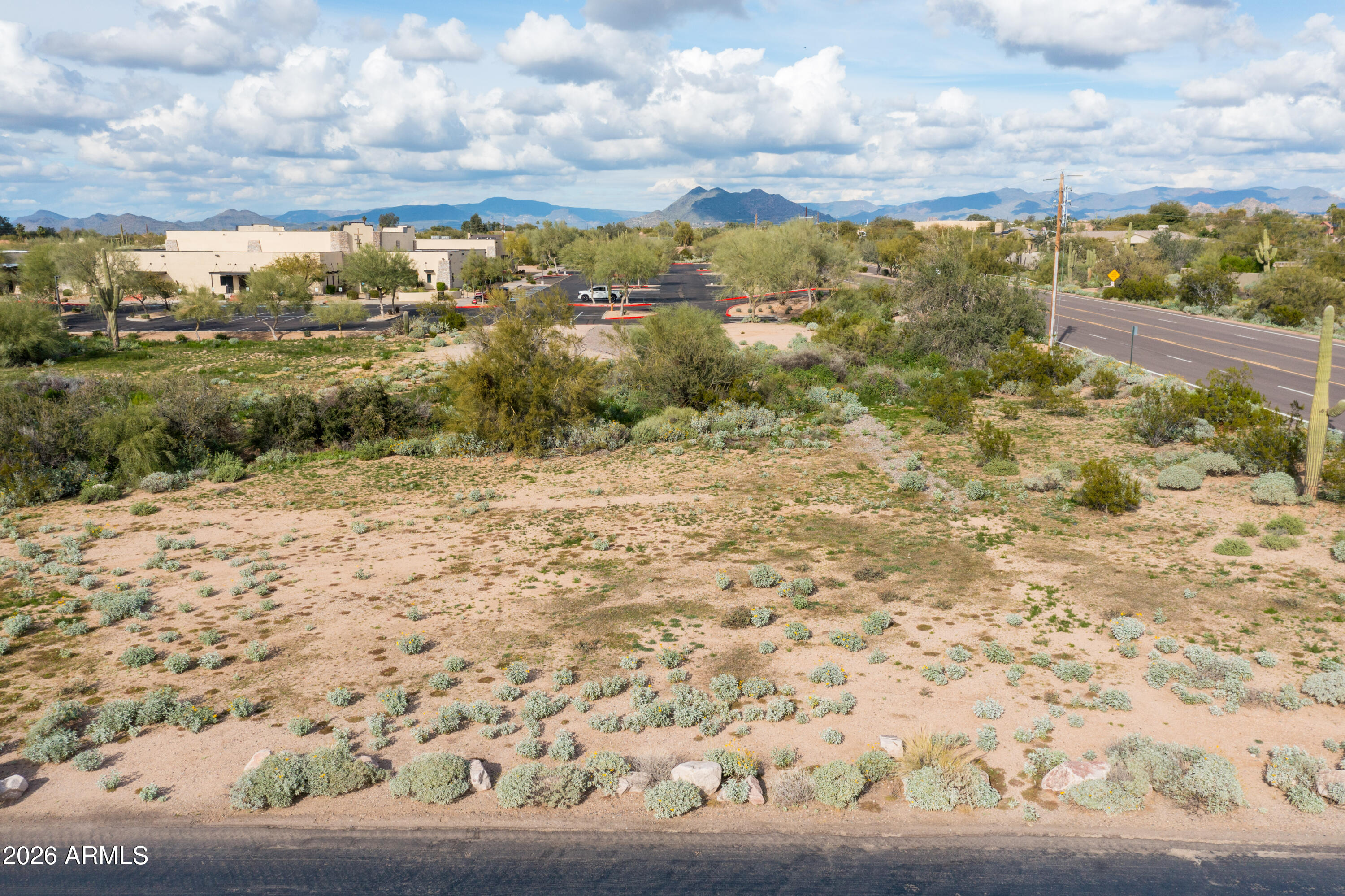Welcome to an incredible opportunity to own an acre+ in the prime area of north Scottsdale. This large corner lot is located in an area of other custom homes that is close to shopping, dining, outdoor activities and minutes from Cave Creek. There is sewer in the adjacent street and gas is available. This beautiful lot is surrounded by amazing views of the desert and the mountains perfect for the custom build home of your dreams.
