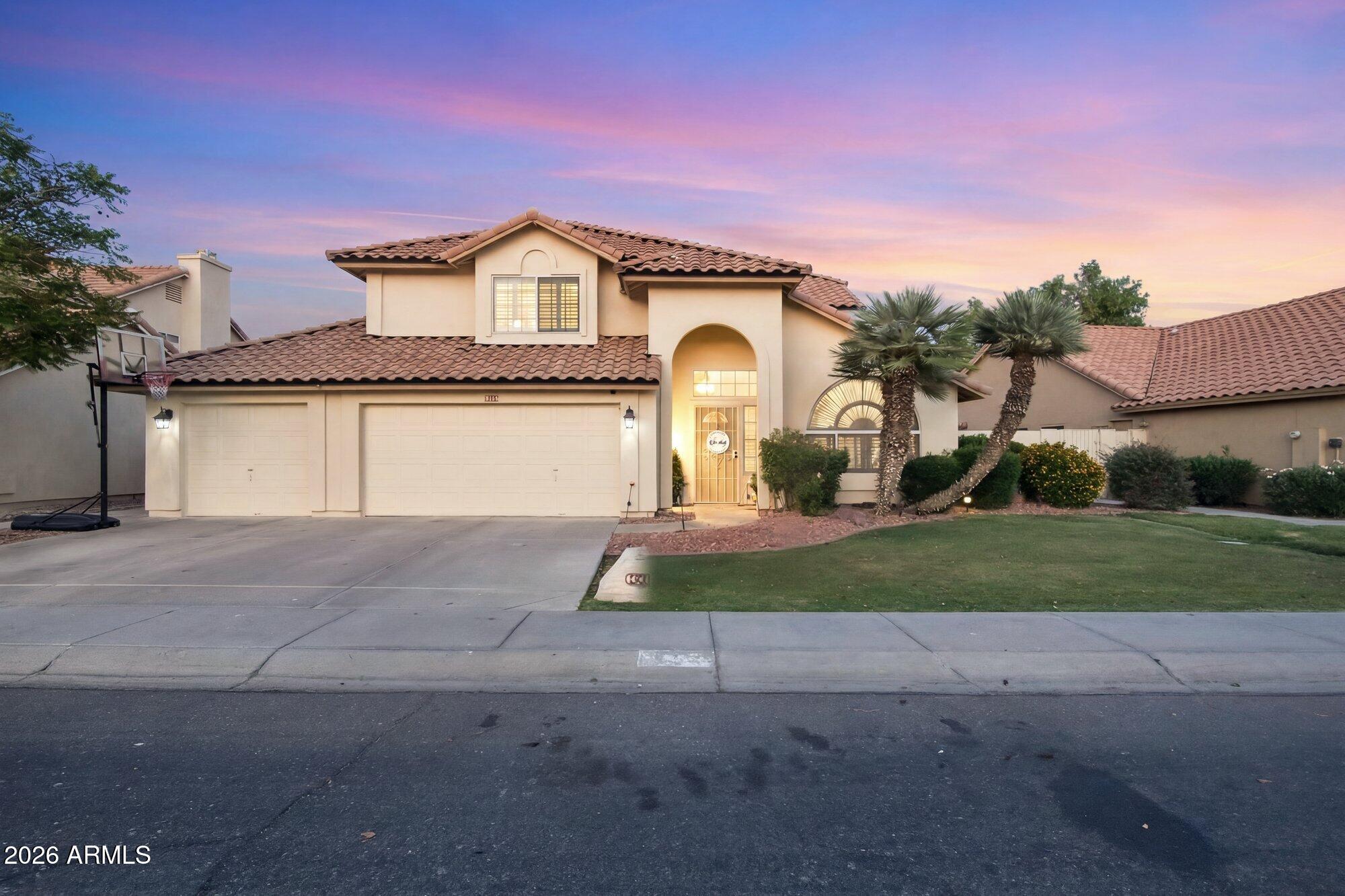 ARE YOU READY TO FALL IN LOVE??? Rare waterfront location features shimmering lake water views.  Enjoy your slice of paradise in this gorgeous updated home featuring a recent roof, updated laminate & carpet flooring, custom interior paint, remodeled master bathroom, updated kitchen with stainless appliances and granite counters, modern lighting throughout.  A sleek contemporary vibe in tones of grey and white will match any decor. Darling laundry room with custom cabinets/built-ins for an efficient space. Cool sparkling blue play pool, extra large patio area for entertaining in style with a lush green grassy yard spanning to the shoreline of the lake. This home shows like a postcard and is a rare find~! Did I mention the 3 car garage~!?HURRY!!