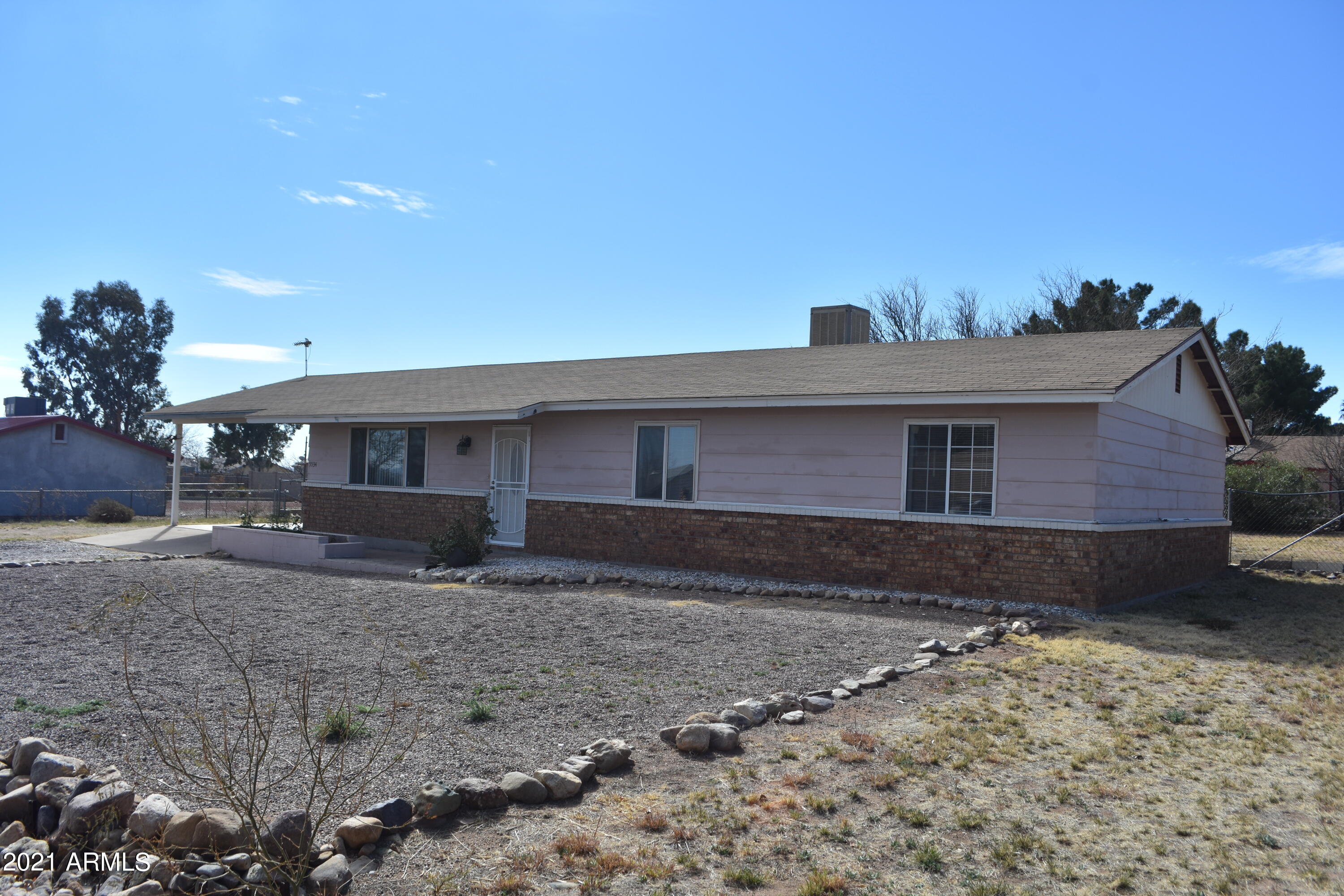 Great three bedoom two bath with wonderful mountain views and great yard.  Kichen has granite counter tops, remodeled bathrooms, and great outdoor space for entertaining or   just enjoying  the fresh air and views.  
Space for four cars to park in carport with two side gates for RV's also, nice covered patio and shed for storage.  Less than fifteen minutes to Fort Huachuca and all other shopping.  Newer refrigerator.