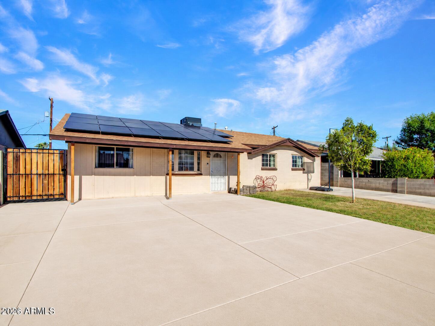 NO HOA and fully paid-off solar panels! Take advantage of up to $17,500 in available grant assistance for qualified buyers. This beautifully updated 4-bedroom, 3-bathroom home in Maryvale Terrace offers the perfect combination of comfort, efficiency, and value. Features include new kitchen cabinetry, updated tiled bathrooms, and a spacious floor plan designed for everyday living. The gazebo and storage unit convey with the property, providing additional outdoor enjoyment and storage space. Conveniently located near parks, shopping, dining, schools, and major transportation routes. A rare opportunity to own a move-in ready home with significant energy savings and no HOA restrictions.