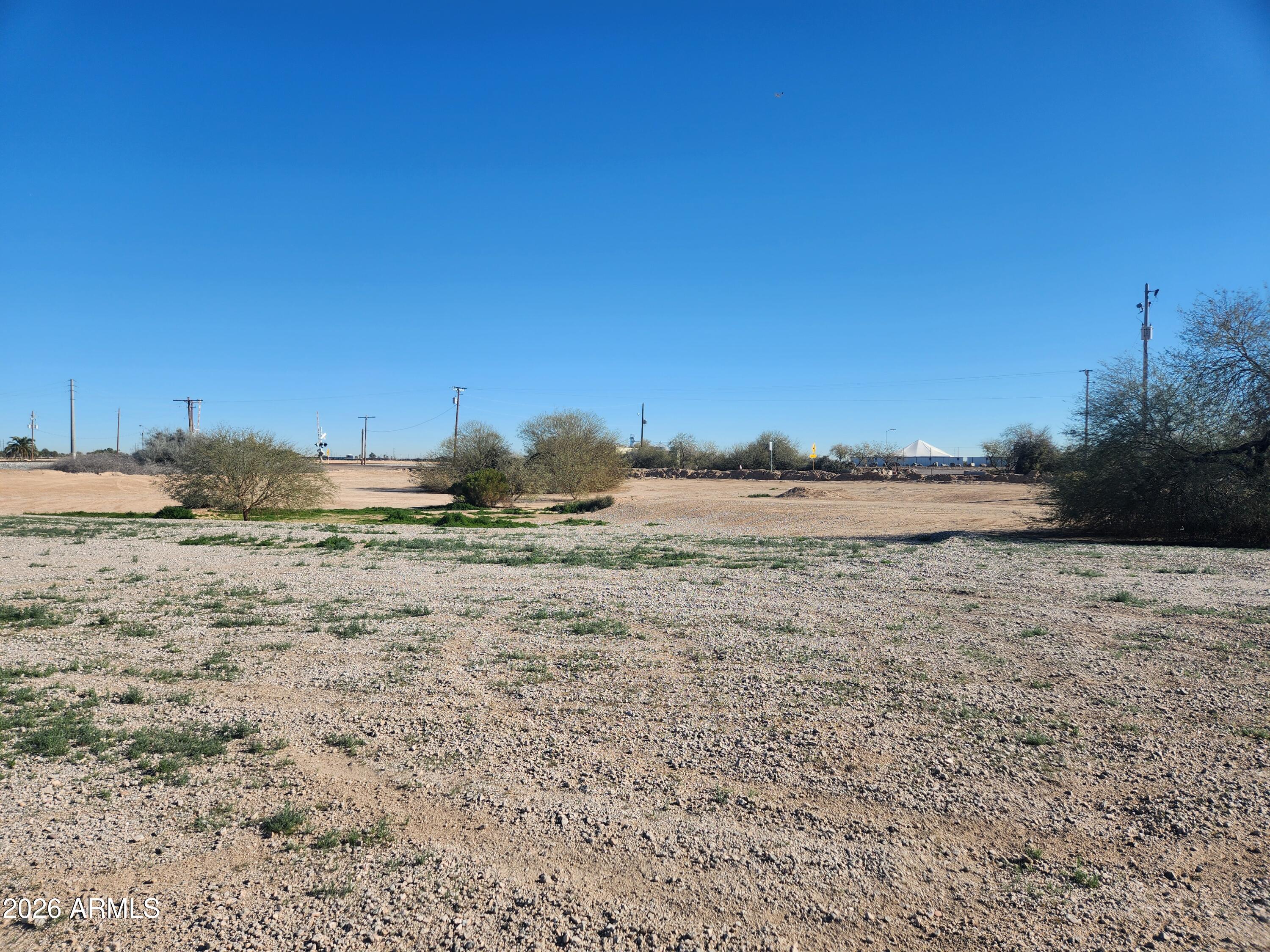Welcome to a rare opportunity to own 4.58 acres of prime vacant land at 6200 S Dean Rd in Buckeye, Arizona. This level, expansive parcel offers exceptional potential for a variety of uses, boasting direct frontage on Dean Road and easy access to surrounding amenities and major corridors. According to county records, the property is identified by APN 504-44-020S and provides a clean canvas for residential acreage or investment buyers seeking flexibility and space in a rapidly growing West Valley submarket. The land's General Commercial (GC) zoning allows for a range of future possibilities (buyers should verify intended use with the city), and utilities including water and electric are available on site, easing development considerations. This acreage presents an exciting opportunity to build or hold in a well-positioned Buckeye location with proximity to local services and arterial roadways. Don't miss your chance to capitalize on one of the few larger parcels remaining in this dynamic area.