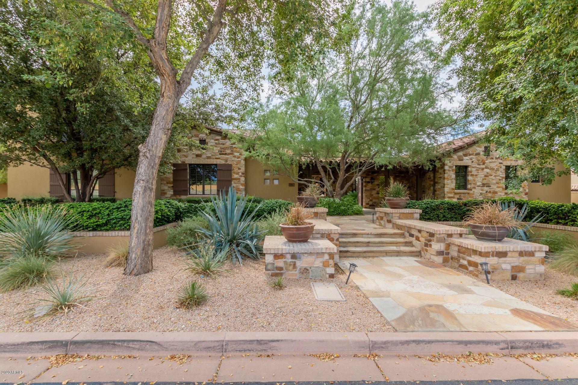Significant price adjustment w/ huge incentives. Located in the Arcadia neighborhood of Silverleaf is a completely reimagined Mediterranean Hacienda home built by Pridemark Residential. Architecturally designed by Mark Candelaria, the home features a sophisticated transitional open floor concept with symmetrical lines which provides style combined with functionality. Upon arrival you will be greeted with a large front courtyard featuring a gas fireplace and seated area designed for rest and relaxation. Open the front door and step inside the fully remodeled home; immediately your attention will be captured by French Oak hard wood floors, 20' ceilings w/ oak beams, gas fire place and cyber audio system. Admire the layout of the professionally designed kitchen w/ custom cabinets, marble & quartz countertops. The kitchen will impress those who love to cook and entertain. High end appliances you would expect such as a Wolf Stove & Subzero Refrigerator, dual dishwashers, double sinks and double convention ovens are standard. The grand living area featuring an entertainment center built by Dagher design, gas fireplace & electric Hunter Douglas Blinds creates an area designed for family living and entertaining. Sliding pocket doors in the family room delivers true in-door out-door living. Move freely from the grand living area  through the pocket doors into the private outdoor paradise. The perfectly rectangular half-acre lot featuring an oversized backyard spotlights a 45 foot linear bar, privacy, partial views of the McDowell Mountains, an oversized self-cleaning /heated pool, heated spa, fire pit, misters, fans, tv's, outdoor bathroom and cyber sound. Enjoy all the amenities Silverleaf has to offer such as an award winning golf course designed by Tom Weiskoff. Fine dining and shopping. A+ rated schools, hiking and biking paths and so much more. To find out about what incentives are being offered on the home please contact the listing agent as we are looking to move the property now.


The master wing is your own private oasis secluded from the rest of the home. The 21X19' master suite highlights a gas fire place, plantation shutters, Hunter Douglas Blinds and French Oak Beams The master bathroom contains his and her vanities, stand-alone tub and a walk-in shower with 2 shower heads. The 12.X16' master closet has built in custom drawers, shelving and retractable rods. Each bedroom is larger than 205 square feet w/ a private en-suites, plantation shutters and walk-in closets. A 4.5 car garage with custom cabinets can house 4 SUV's, golf clubs and mountain bikes with plenty of room to spare. The home is truly a one of a kind property that  combines elegance and grace, yet is warm and inviting. The home is grand in scale yet manageable and cozy with minimal maintenance costs.. Come see this home for the first time again, as it will not last long.