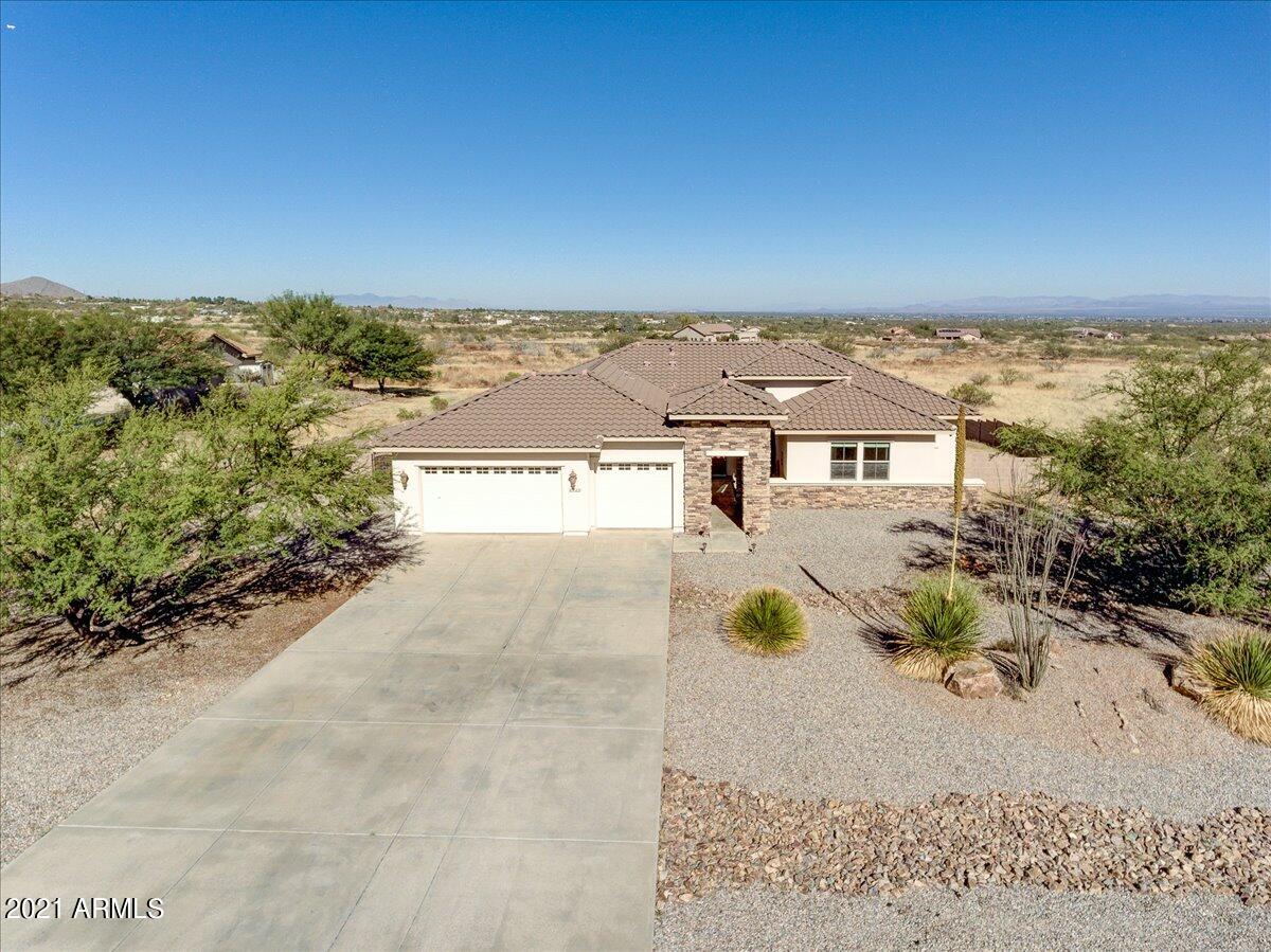 Beautiful 4 bedroom 3 full bath split floor plan home in Vista Del Oro. Sits on 1 acre with back yard walled in and ready for whatever you desire. Formal dining room with french doors, family room with gas fireplace, kitchen with granite counters and cabinets with pull out shelving. Large master bedroom with on suite with jetted garden tub.  Large 3 car garage and welcoming courtyard. Call today for your private showing.