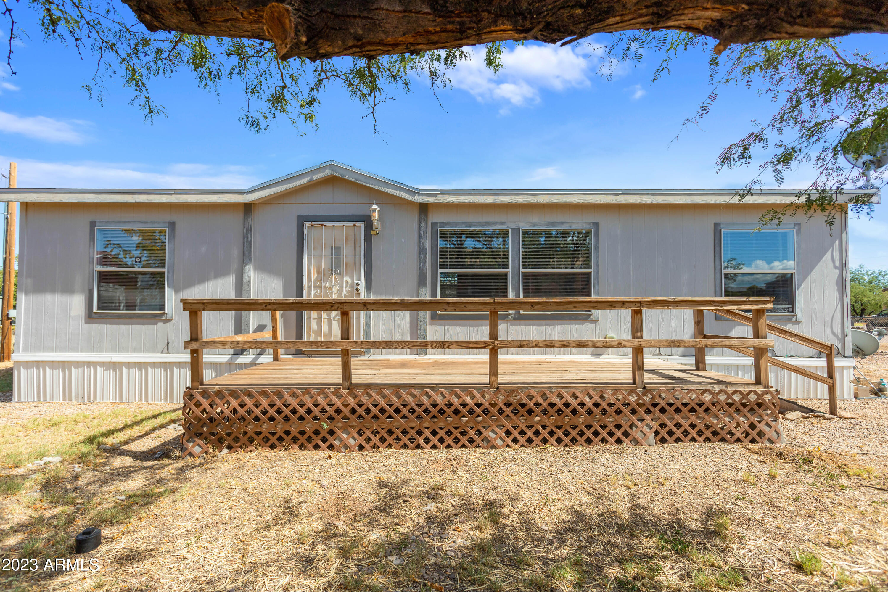 3 bedroom 2 bath home on a fully fenced lot awaits its new owners. This bright and clean home features a gated entry and large deck for outdoor enjoyment along with a storage shed in the back yard. Call today for your private look and call this one home.