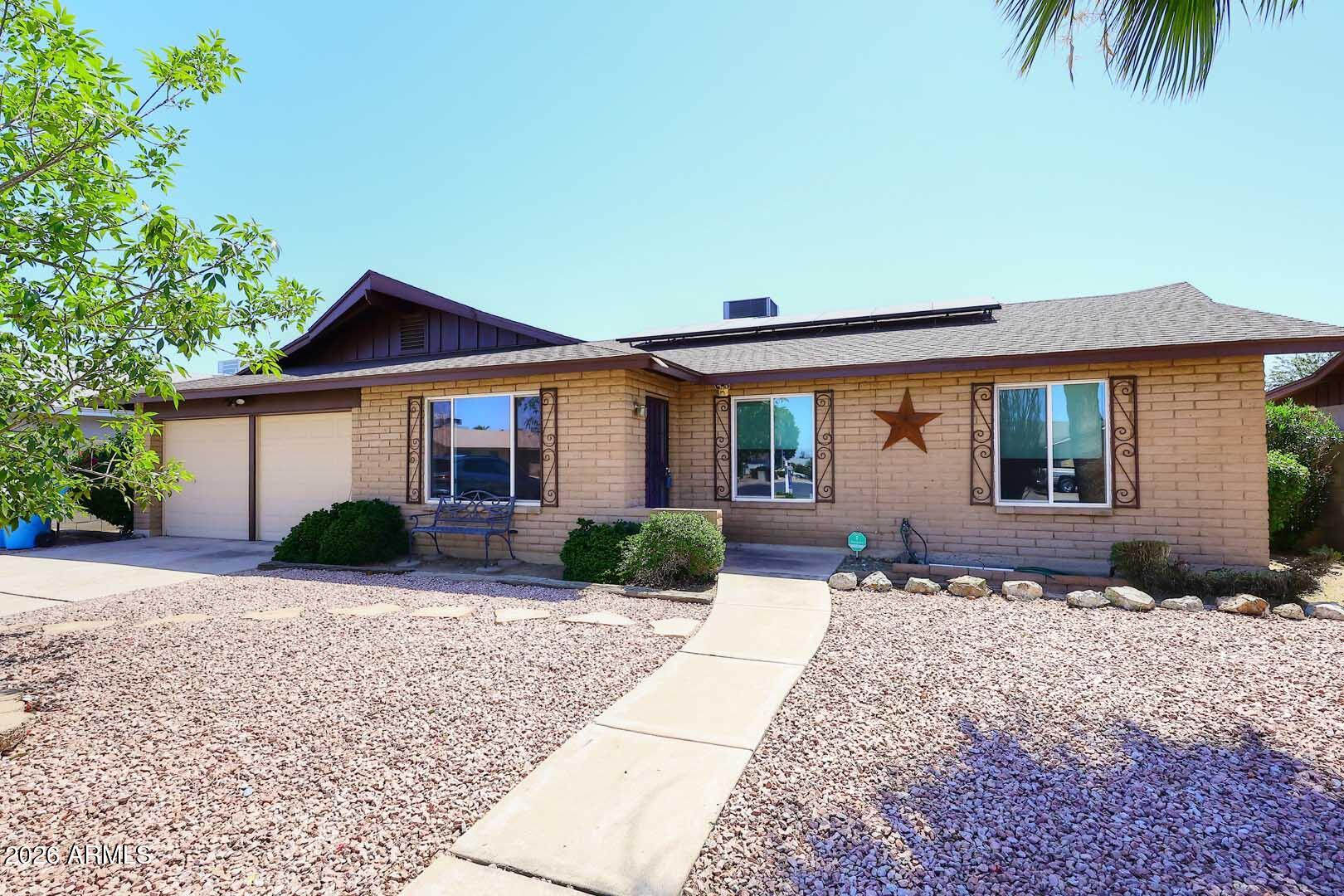 This house comes with a REDUCED RATE as low as 5.25% (APR 5.698%) as of 05/29/2026 through List & Lock™. This is a seller-paid rate buydown that reduces the buyer's interest rate and monthly payment. Terms apply; see disclosures for more information. Welcome home to this beautifully refreshed North Phoenix property offering 1,590 sq. ft., 3 bedrooms, 1.75 bathrooms, and a 7,096 sq. ft. lot near Cactus & 33rd Avenue. The work is done and this home is ready for its new owners! Recent improvements include fresh interior and exterior paint, popcorn ceilings removed and retextured throughout the home and garage, roof repairs completed, and a bright, clean move-in ready interior. Check out in photo's detailed list of improvements. Major updates provide peace of mind, including a roof replacement, owned solar system, HVAC replaced in January 2022, all windows replaced in January 2025, front and patio doors replaced in 2025, and hot water heater replaced in 2021. With leased solar already in place, buyers can enjoy added energy efficiency and potential utility savings while benefiting from the many improvements completed throughout the years. This block construction home features a spacious floor plan with formal living space, a cozy fireplace, generous kitchen with abundant cabinetry and breakfast bar seating, updated flooring, and plenty of natural light throughout. Step outside to enjoy the covered patio, spacious backyard, firepit area, mature landscaping, and storage shed--offering endless possibilities for entertaining, gardening, pets, or simply enjoying Arizona's beautiful weather.
Conveniently located near shopping, dining, schools, parks, and freeway access, this home offers an exceptional combination of value, updates, and lifestyle.
(Freshly Updated & Ready for Its New Owners!