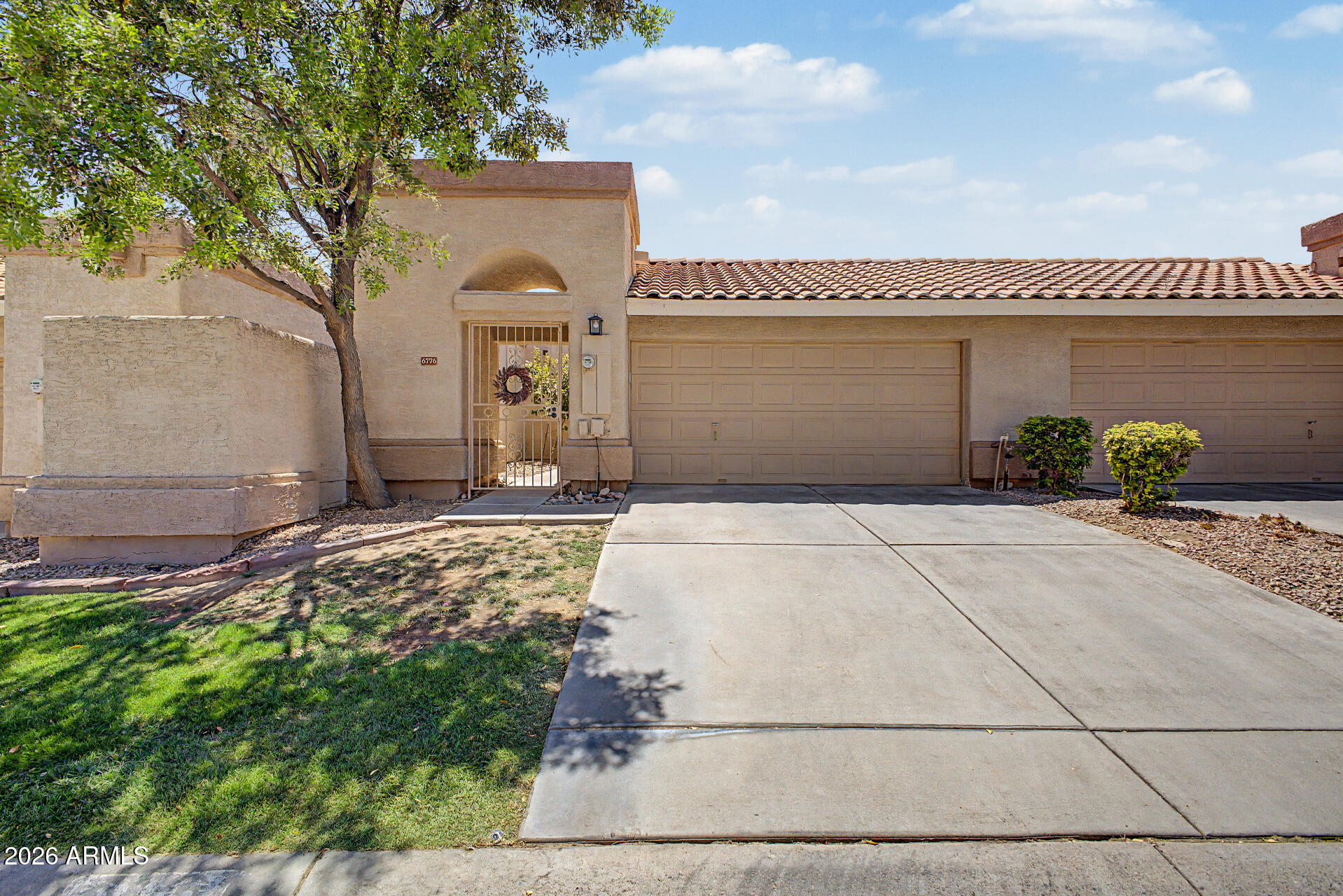 Charming 2-bedroom home at Brittany Lane! Enjoy the convenience of a spacious 2-car garage and a gated courtyard. Inside, the inviting living/dining room welcomes you with soaring ceilings and a cozy fireplace. The kitchen features white cabinetry, black granite countertops, track lighting, stainless steel appliances, and a breakfast nook. The main bedroom offers direct backyard access, plush new carpeting, a closet, and a bathroom with dual granite vanity and tub/shower combo. The interior laundry closet adds everyday convenience. The private backyard has a covered patio, perfect for relaxing or entertaining. Residents enjoy access to a sparkling community pool, lush green spaces, and proximity to Celaya Park. Near grocery stores, shops, restaurants, and schools. Come see today!