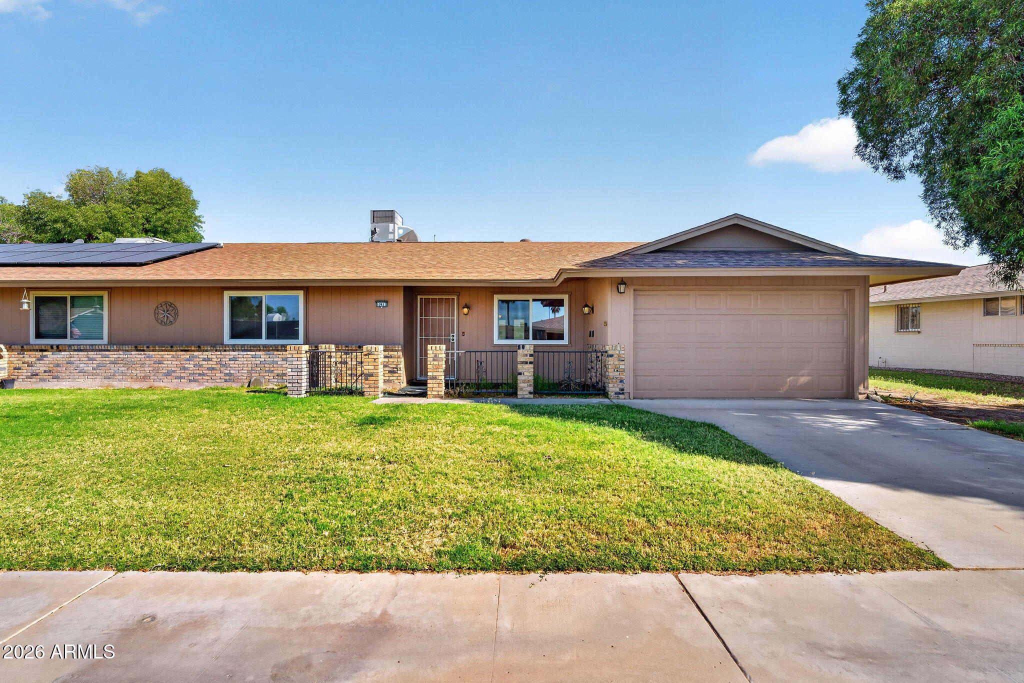 PRICED BELOW APPRAISED VALUE. Home is offered at a discount in exchange for a straightforward transaction. Welcome to 10413 W Roundelay, a well-located Sun City home offering comfortable, low-maintenance living in one of the West Valley's most established active adult communities. The home features a practical single-level floor plan with 2 bathrooms, a 1-car garage, and generous living space ready for its next owner's personal touch. The layout provides a comfortable main living area, functional kitchen space, and easy indoor-outdoor flow for enjoying Arizona's weather. Located near shopping, dining, golf, medical services, recreation centers, and everyday conveniences, this property is a great opportunity for a buyer looking to update, customize, or settle into the Sun City lifestyle.