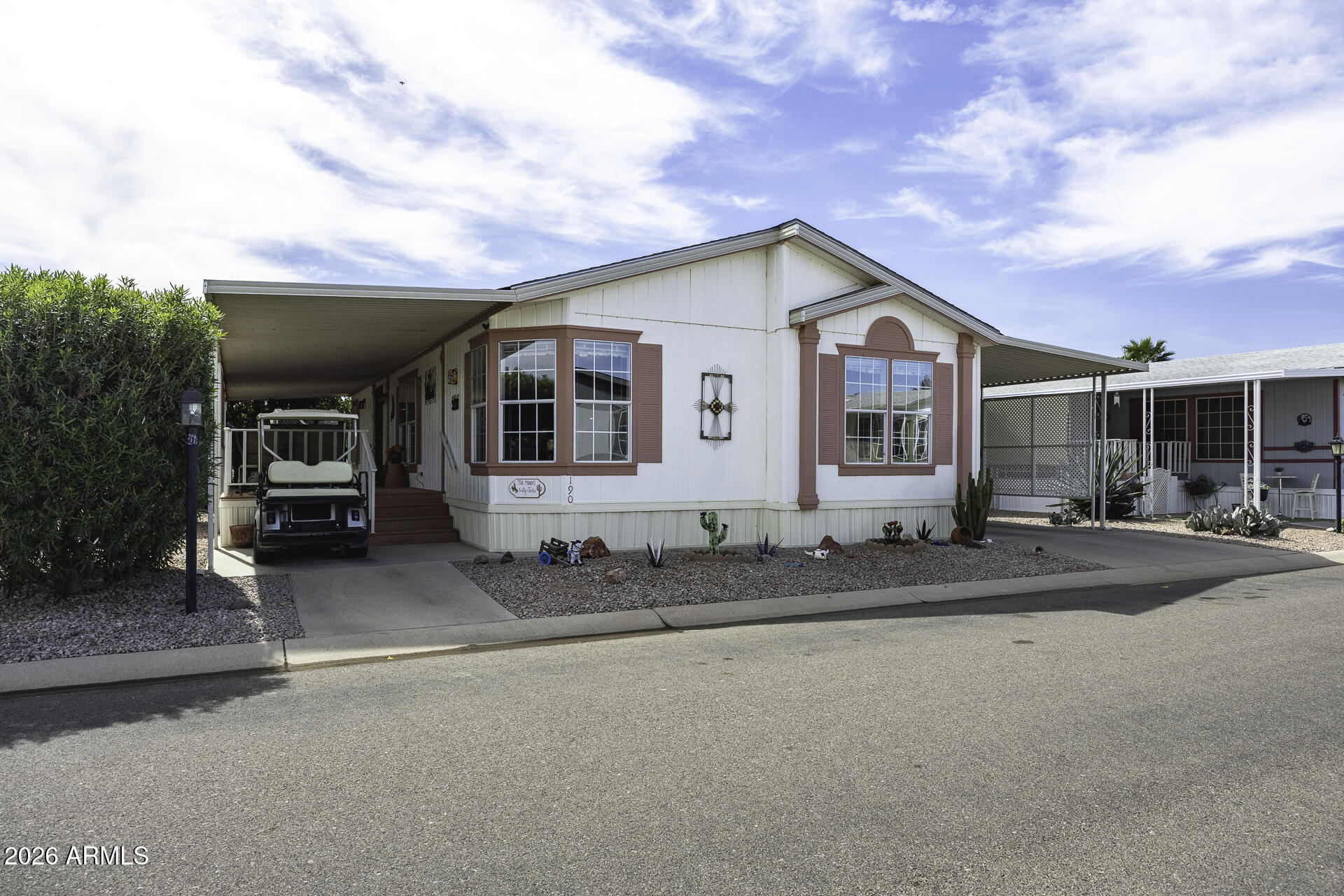 Welcome home to your 55+ retreat! Step inside to this fully furnished home that includes the golf cart, ready with new batteries. The home features vaulted ceilings, tile in all the right places and 2 bedrooms, with an upgraded shower in the ensuite. The bonus area offers a great option for a home office or den. Enjoy time outside on the large Trex Deck, or the other 2 patio options avavilable. A large, storage/work shed and fruit trees are another added bonus to this beautiful home!