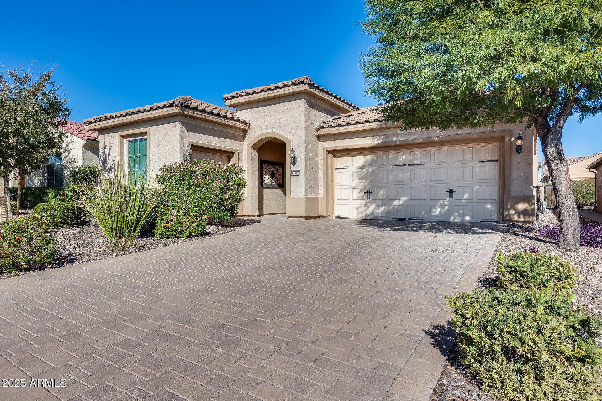 Welcome to this stunning home in the highly sought-after Del Webb Sun City Anthem community! This popular Preserve floorplan features 2 bedrooms, 2 baths, plus an enclosed den an extended length garage with golf cart bay. The home sits on a north/south-facing, fully enclosed private lot with a beautifully upgraded saltwater pool, surrounded by elegant travertine decking and a matching gourmet outdoor chef's kitchen and grill--perfect for entertaining and relaxing in style.
Inside, you'll find a spacious great room with a custom-built-in wet bar with ample storage space, upgraded espresso cabinetry, and stunning quartz countertops in the chef-inspired kitchen, complete with a gas cooktop and stainless steel appliances. The covered patio, low-maintenance desert landscaping, and oversized L-shaped lot make this home ideal for both comfort and outdoor living. If you love to entertain, unwind by the pool, and enjoy resort-style living, this home truly shines!