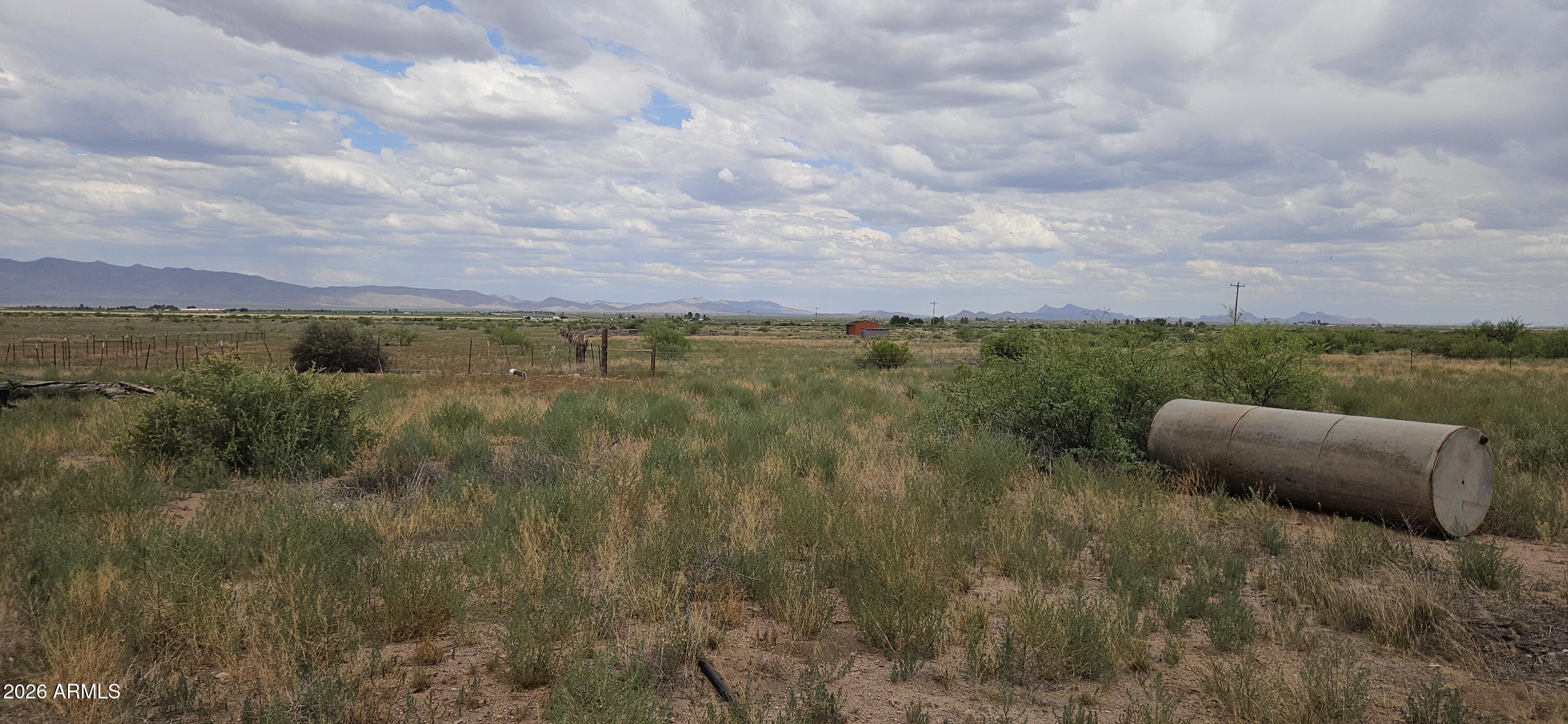 A rare opportunity to own 52 acres of prime farmland with grandfathered irrigation rights.  Existing irrigation well has the ability to produce 400 gpm.  It currently has a domestic pump but could be upgraded to a high output irrigation pump.  With power on the property and located on a paved road this makes for an outstanding opportunity.  So much potential for agriculture.