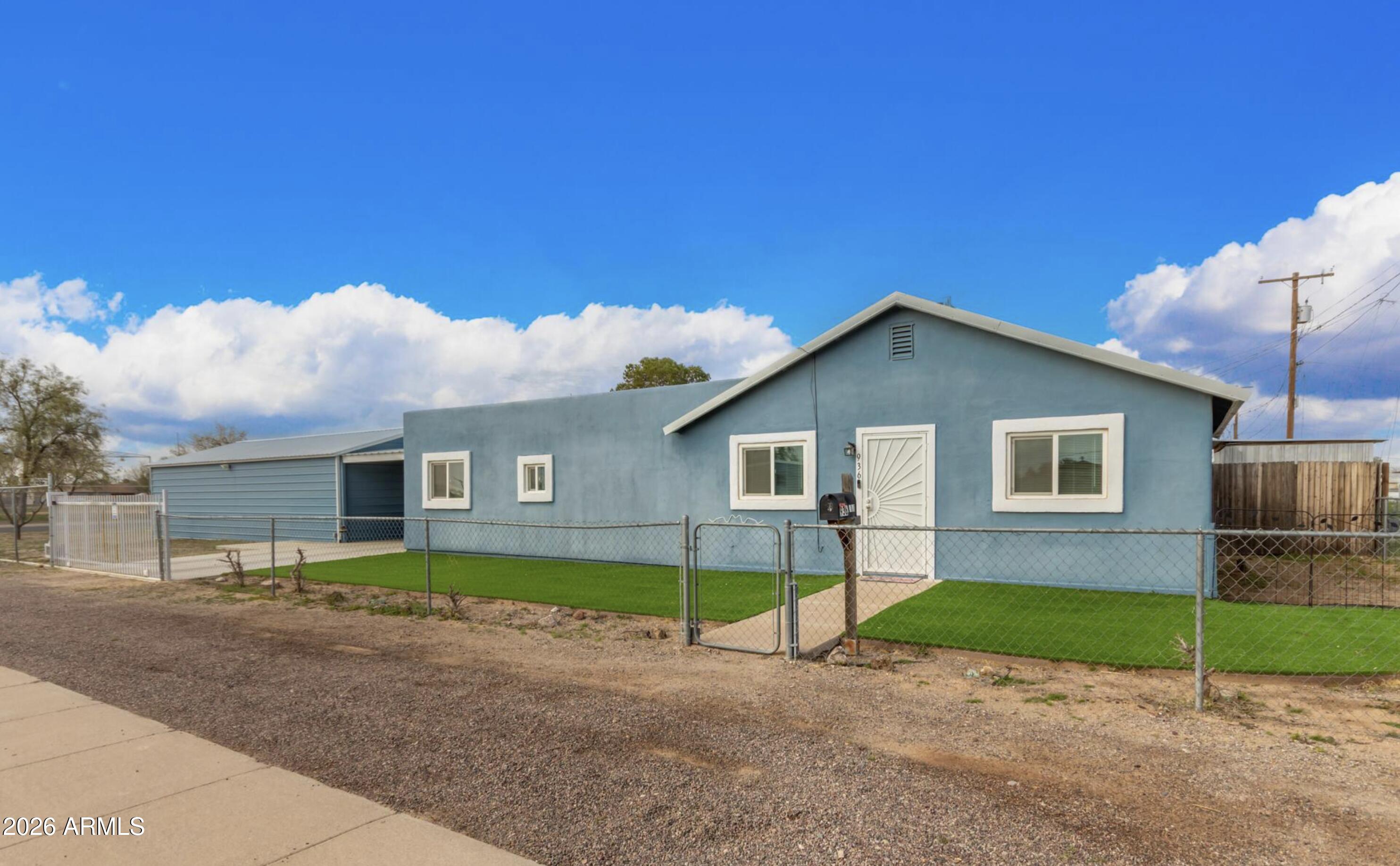 Short sale. Sold AS-IS. No HOA! Corner lot across from North Park w/ 780 sqft A/C & insulated workshop (2019) w/ half bath -- a hobbyist's dream! 2 electronic remote gates, full RV hookups w/ 30-amp electric & covered carport. 3 bed + den/office (easily 4th bed). Updates galore: $5K electrical upgrades, HVAC 2018, roof 2020, paint 2022, bath 2023, H2O heater 2022, W/D 2022, dual pane windows, blinds & Whirlpool appliances. Kitchen features a countertop, dishwasher & lazy Susan. Fantastic curb appeal. Total sqft includes home & workshop per county.