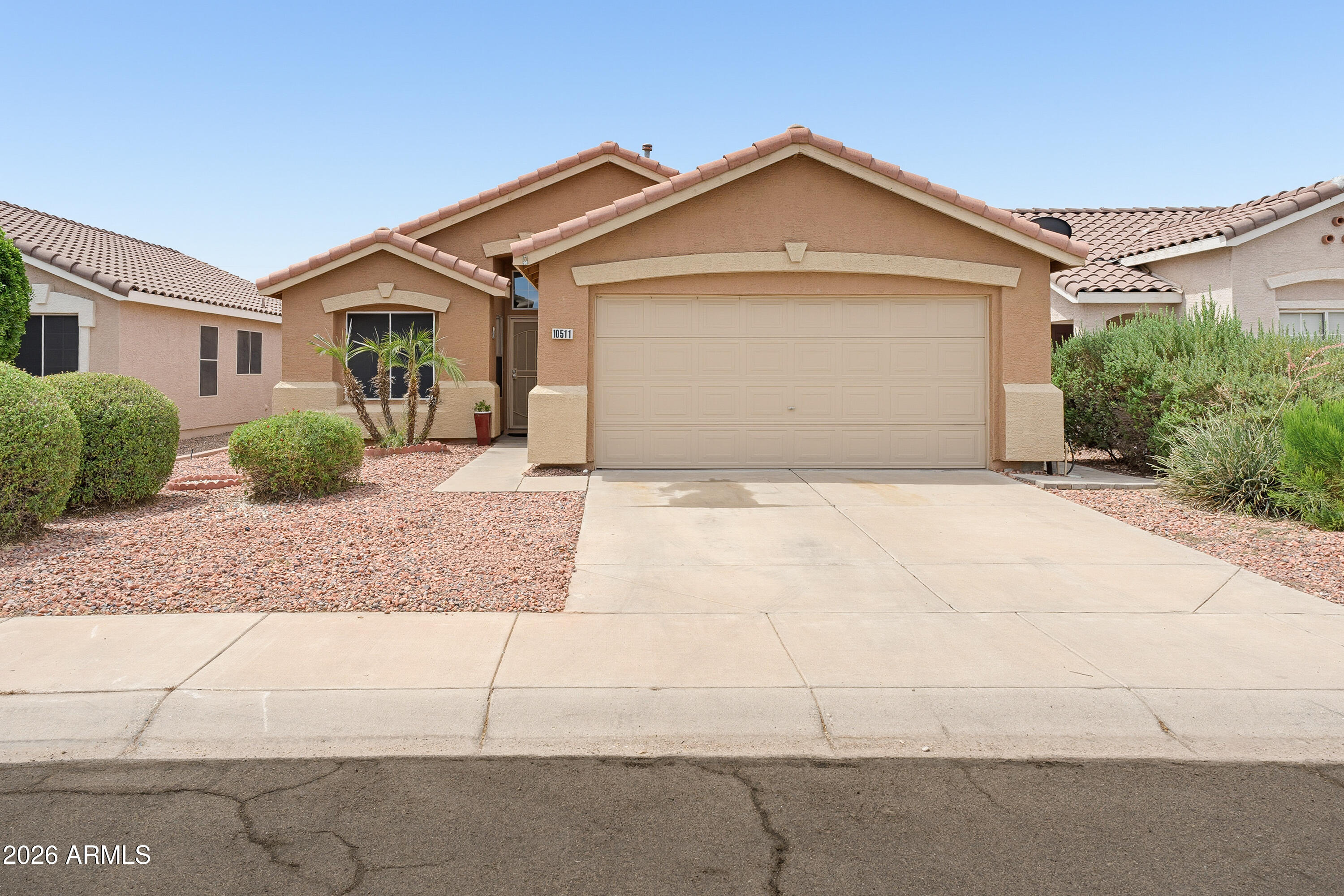 Owned Solar and ideally located in Glendale with quick access to Loop 101, shopping, dining, entertainment, and State Farm Stadium! This beautifully updated 3-bedroom, 2-bath home also features a versatile den with custom barn doors that can easily serve as a home office, playroom, or potential 4th bedroom. Inside, you'll find fresh paint throughout, soaring ceilings, abundant natural light, and no carpet--featuring a combination of tile and wood flooring throughout the home. The spacious kitchen offers freshly painted cabinetry, updated countertops, stainless steel appliances, and a modern sink and faucet. The primary suite includes wood flooring and an updated bath. Enjoy the low-maintenance backyard with an extended paver patio and large concrete entertaining area. Additional highlights include solar panels, security screen door, epoxy garage floor, newer water heater, updated lighting and ceiling fans, and exterior paint completed within the last five years. A fantastic opportunity in a prime Glendale location!