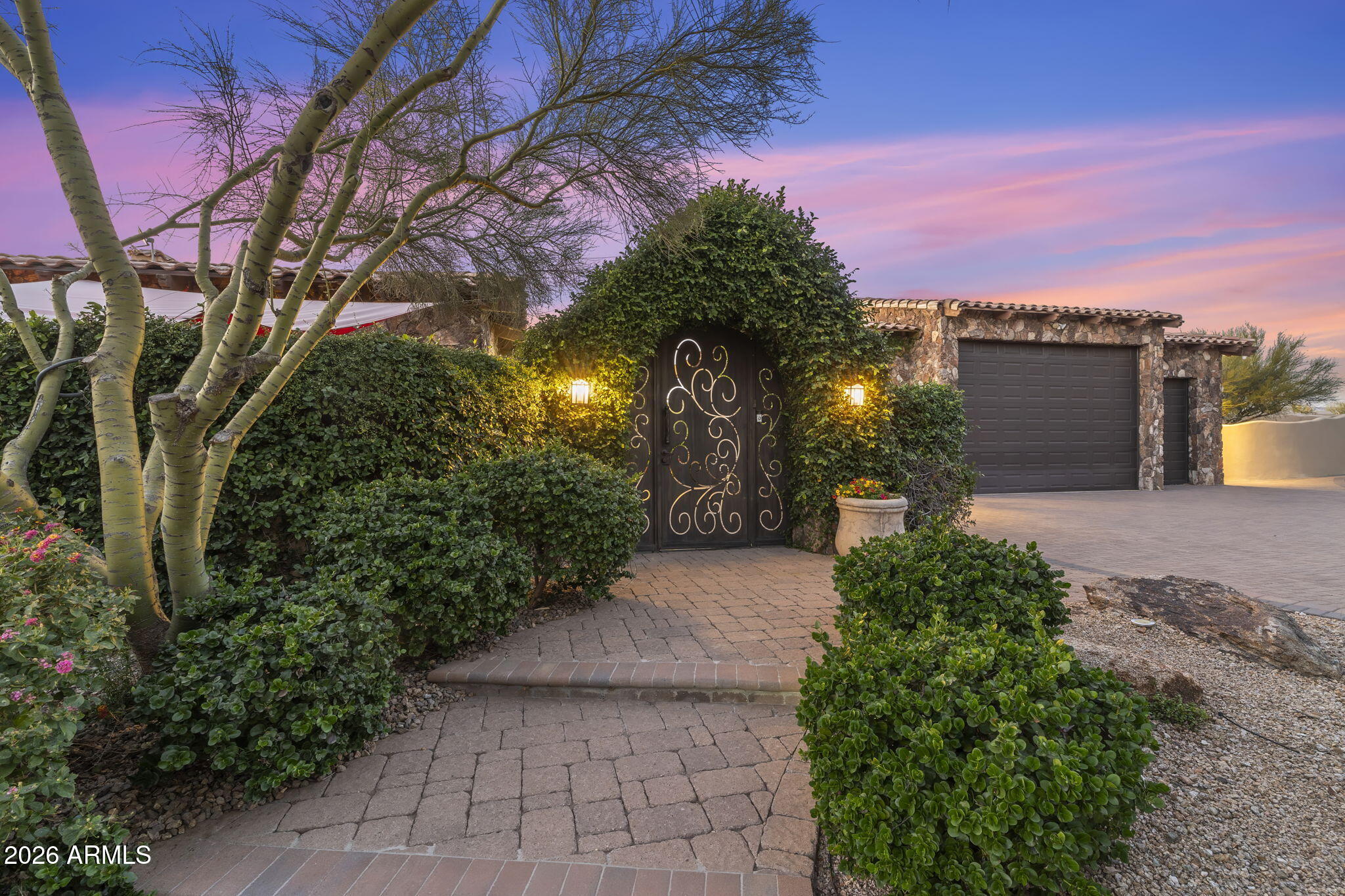 Nestled on nearly 8 pristine acres in North Scottsdale, this exceptional equestrian estate offers a rare blend of luxury living, privacy, and true ride-out desert access. Bordering scenic riding trails, horse enthusiasts can saddle up and ride directly from the property into the surrounding Sonoran Desert landscape without trailering. A long, freshly paved private drive leads to the beautifully updated residence, where timeless architecture meets modern comfort across 4,402 square feet of thoughtfully designed living space. The home features dual primary suites, expansive entertaining areas, fresh interior paint, a new roof, and seamless indoor-outdoor living designed to embrace Arizona's year-round lifestyle. The resort-style grounds are framed by mature desert landscaping, a gated courtyard entry, and multiple outdoor living spaces that create a peaceful estate setting with exceptional privacy and mountain views. Designed with both functionality and elegance in mind, the property also includes an oversized 4-car garage and additional guest/living quarters.

Equestrian amenities are equally impressive, featuring a 6-stall barn, tack facilities, arenas, and ample space for training, riding, and enjoying the equestrian lifestyle at home. Whether you are seeking a private desert retreat, a premier horse property, or a luxury estate with direct trail access, this one-of-a-kind North Scottsdale property delivers the very best of Arizona living just minutes from world-class dining, golf, and shopping.