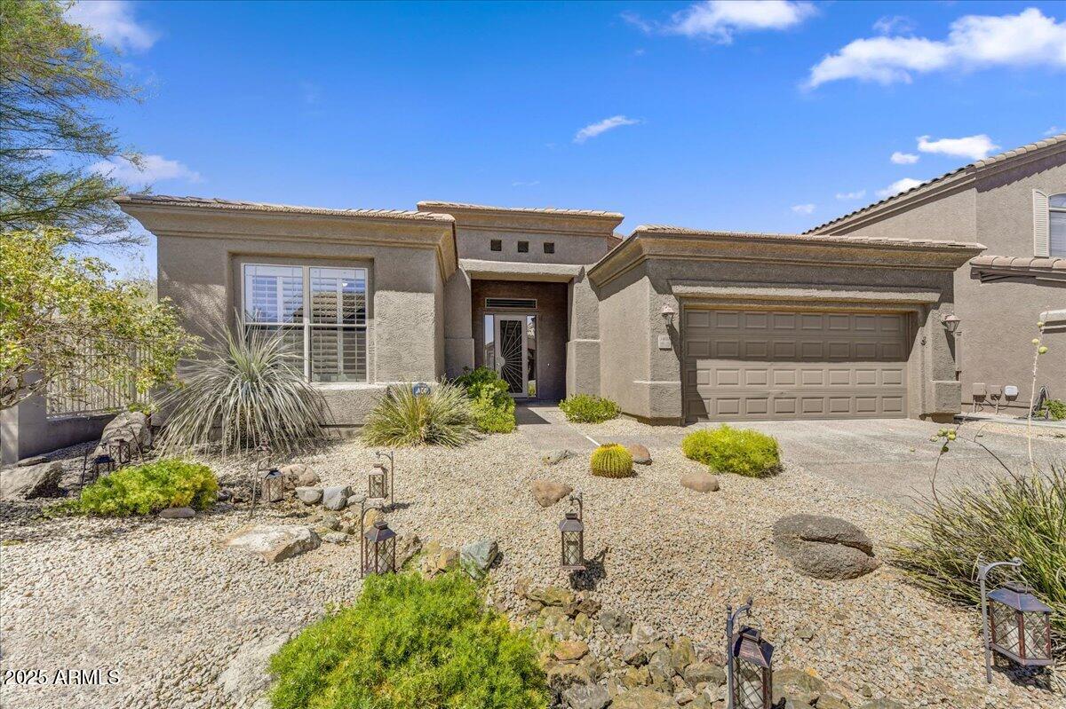 Welcome to this impeccably maintained home in the prestigious gated community of Dove Valley Ranch! From the moment you step inside, you'll be greeted by a warm and inviting atmosphere, complemented by bright, open spaces that offer endless possibilities to suit your lifestyle. The gourmet kitchen is a true entertainer's delight, featuring an expansive island, abundant cabinet storage, and a dedicated coffee and refreshment area. The spacious master suite overlooks the serene natural landscape, providing breathtaking sunrises and sunsets right from your window. Step outside into a tranquil backyard oasis, where nature and privacy blend seamlessly to create the perfect retreat. The third bedroom is currently used as an office but can easily be converted back into a bedroom.