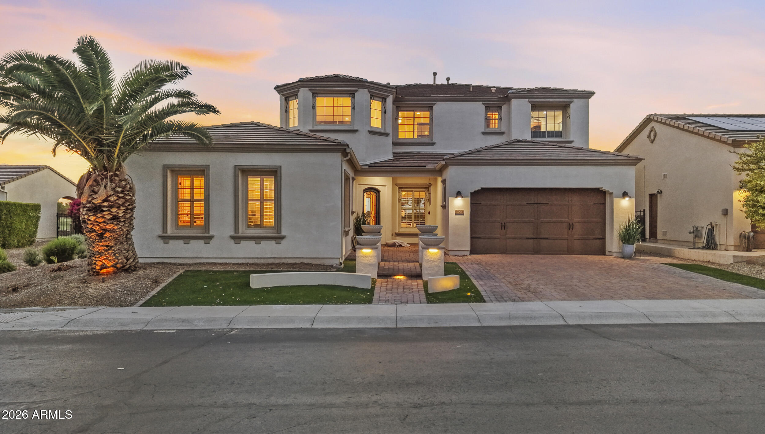 Mountain views and panoramic sunsets! Featuring a premier golf course lot, OWNED solar, a downstairs primary bedroom, and a casita floorplan, this home is one you don't want to miss! Nestled in the community of Encanterra, enjoy stunning sunsets from the back patio or while you're cooking on the built in BBQ. The home has tons of natural light, a gas fireplace, tall ceilings and double islands in the kitchens. Remodeled bathrooms, freshly tiled kitchen backsplash, new carpet, new refrigerator and new paint (plus so much more!) make this home move in ready! It also features remote-controlled retractable outdoor screen, an upstairs loft, and an open concept. Encanterra itself boasts 4 community pools, an art studio, workout facility, clubhouse, and golf course!