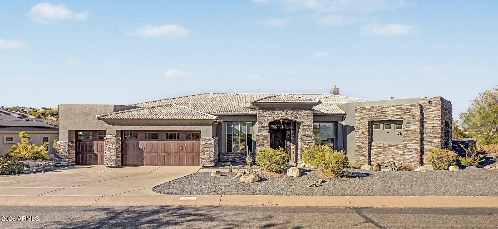 Welcome to your private desert retreat in the highly sought-after Westridge Estates of Fountain Hills. Situated on a generous homesite with breathtaking mountain and desert views, this exceptional residence offers the perfect blend of comfort, character, and Arizona living.

Inside, you'll find updated flooring, spacious living areas, and an inviting layout designed for both everyday living and entertaining. Motorized blinds provide modern convenience while allowing you to effortlessly frame the stunning scenery outside.

The primary suite is truly one of a kind, featuring a distinctive Western-inspired design that captures the spirit and charm of the Southwest. Paired with a uniquely styled primary bathroom, this private sanctuary offers warmth, personality, and an experience unlike anything you'll find in a typical luxury home.

Step outside to your own resort-style backyard oasis featuring a HEATED POOL, perfect for year-round enjoyment. Whether you're taking an early morning swim, entertaining guests, or relaxing beneath Arizona's spectacular sunsets, the outdoor spaces are designed to embrace the beauty and tranquility of the surrounding desert landscape.

Conveniently located near premier golf courses, hiking trails, dining, and all that Fountain Hills has to offer, this exceptional property delivers privacy, character, and the very best of luxury desert living.