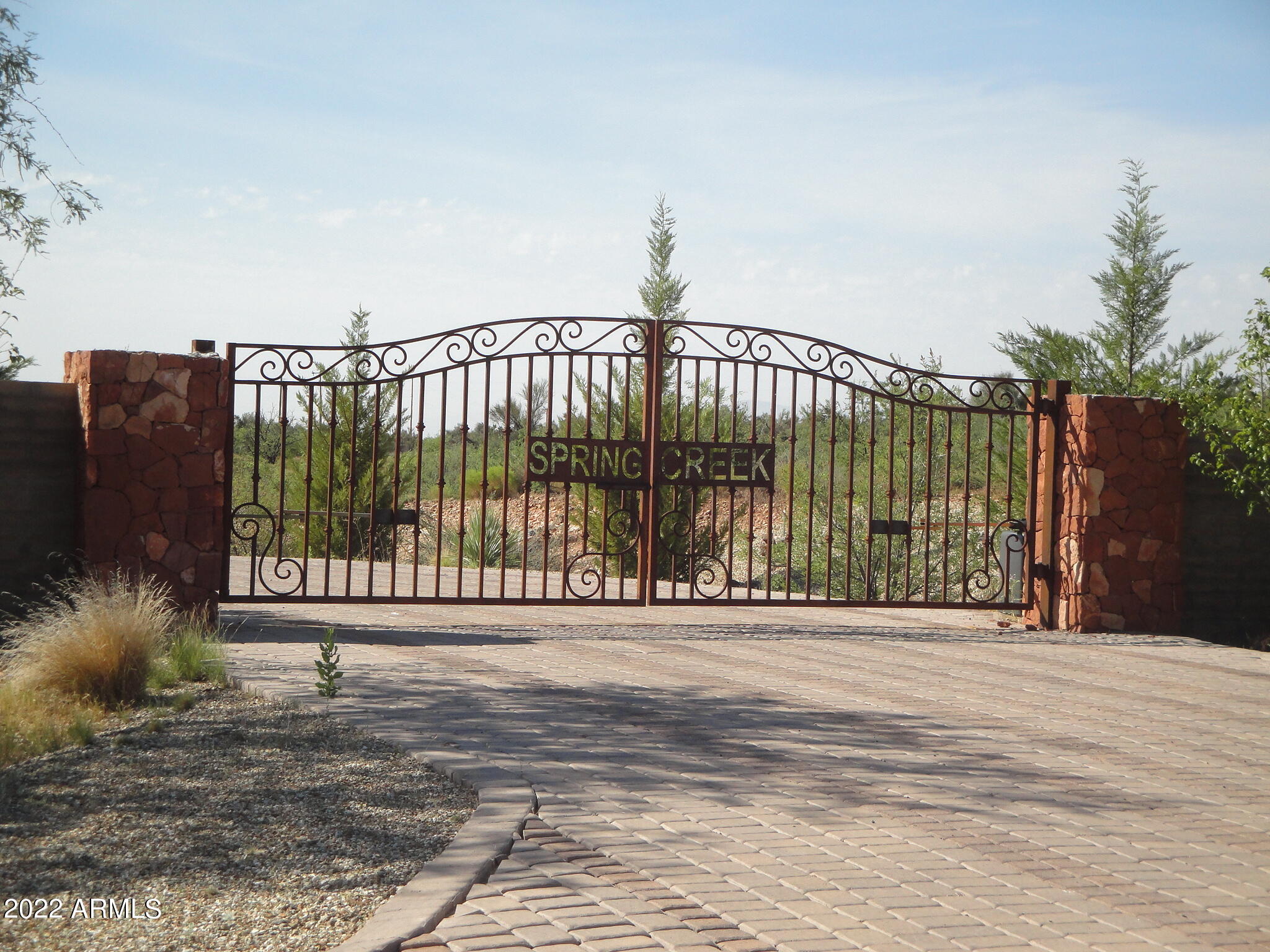 Spring Creek Ranch, just minutes from Sedona!  Phase 1,2,3 & 4 is approximately 246 Acres.  Phase 1 has 15 fully improved lots, gated with paved streets and underground utilities.  This entire property is bordered on three sides by National Forest and one side by State Land.  Many natural springs originate on this property which produce approximately 6,000,000 gallons of water per day to form Spring Creek which flows approximately one mile through Spring Creek Ranch.  Sedona has amazing Restaurants, Hiking, Shopping and Red Rock scenery.  This area is also home to numerous Vineyards & Winery's. The charming town of Cottonwood has the small town feel with the convenience of the big stores such as Home Depot and Walmart. Cottonwood also has an amazing medical center. 
Also, smaller parcels within this parcel are listed For Sale:
Phase 1 - 36 Acres 
Phase 2 - 137 Acres 
Phase 3 - 44 Acres 
Phase 4 - 28.95 Acres