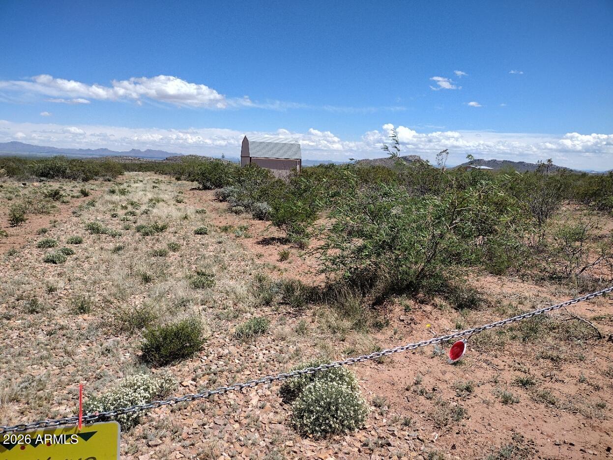 10.10 acres with 360 degree panoramic views. Beautiful property with well drilled and capped 12-5-2022. Very nice 12 x 16 Tuff Shed on Property. Perc and Soil Tests done 3/21/24 - see attached documents.  Electric across the street. Gravel Driveway. Property surveyed and all corners are marked.   Only 8 miles from traffic circle.
Come see this great land. See attached Western Ranch Estates doc. HOA inactive/informal.