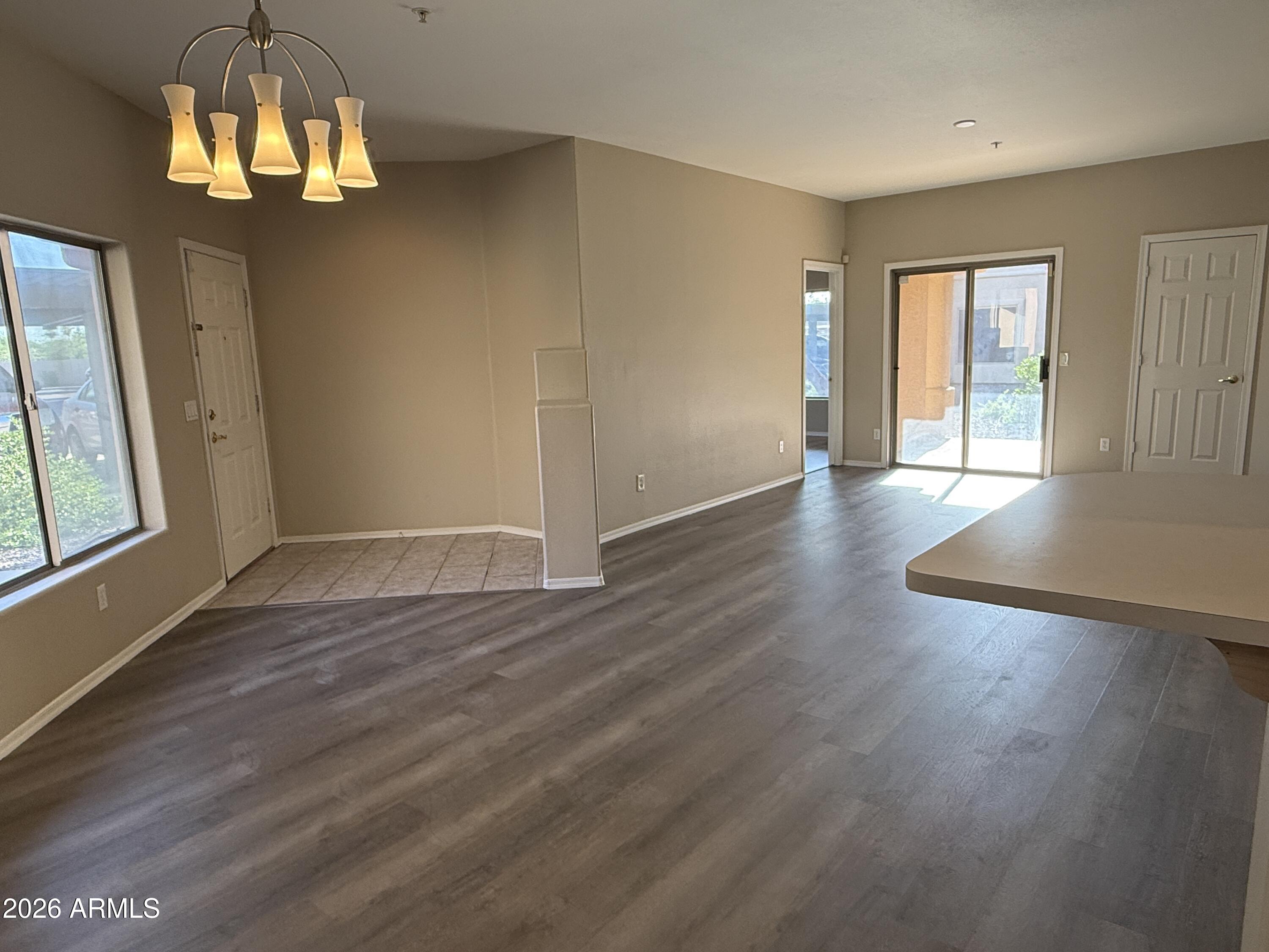 Updated 2 bedroom/2-full bath single level condo!  Brand new stainless appliances including refrigerator, range, microwave, dishwasher, new vinyl plank flooring, new paint. Double vanity master bath, single-carport, (3) slab parking spaces, community pool. Priced for a quick sale.