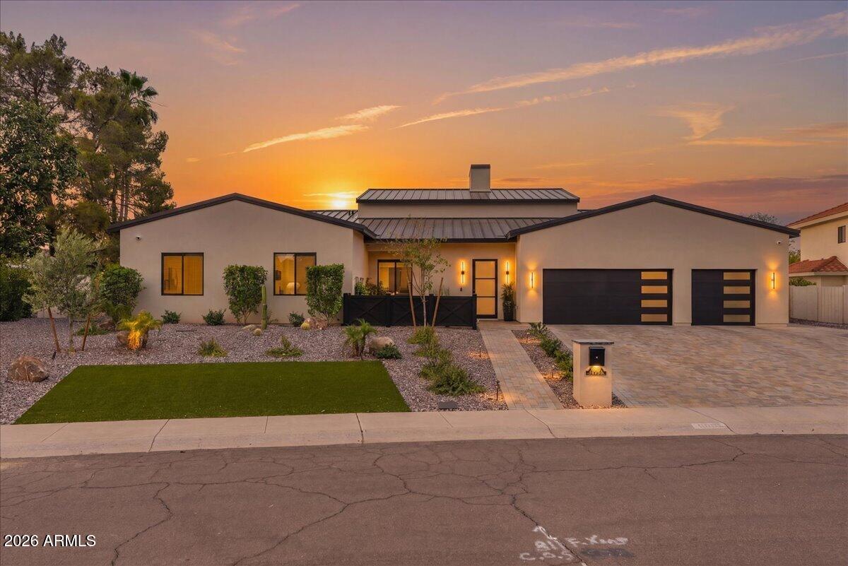 Set on an expansive lot with mountain views stretching beyond, this newly built 2024 residence was designed with a combination of formal and casual settings to host intimate gatherings to large social events. The kitchen, living, and gathering spaces were designed to bring people together--layered with custom cabinetry, natural stone, and thoughtful details that feel both refined and livable. Every finish was selected with intention, balancing warmth, durability, and timeless design.
The primary suite offers a true retreat--private, quiet, and spacious--while each additional ensuite bedroom provides comfort and privacy for family or guests. A separate guest house extends the experience, ideal for hosting or multi-generational living without compromise.
Vaulted ceilings draw your eye upwards while natural light moves through each space, creating a sense of calm and scale. Multi-Sliding Doors that blur the line between indoors and out--inviting you to step into evenings by the firepit, weekends by the pool, and mornings that begin with stillness and desert light. Beyond what you see, this home was built with a level of care that's felt more than it's noticed--from whole-home automation and integrated sound to high-efficiency systems and full-property infrastructure designed for longevity and ease.
Outside, the living continues. A newly added Baja shelf and tile to the existing pool, newly added spa, outdoor kitchen, and dedicated spaces for both entertaining and everyday life create a setting that adapts to any moment--whether it's a lively gathering or a quiet night under the stars. Separate Game Room, Theatre with sliding doors, dedicated AV room, Hidden Pantry, 2 Laundry Rooms, the amenities go on. Located in highly sought-after neighborhood with NO HOA! This is more than a home--it's a place designed to support how you live, host, and unwind. Thoughtful, intentional, and ready to be experienced. Close to the 101, shopping, walking/bike paths. Seller/Agent owned.