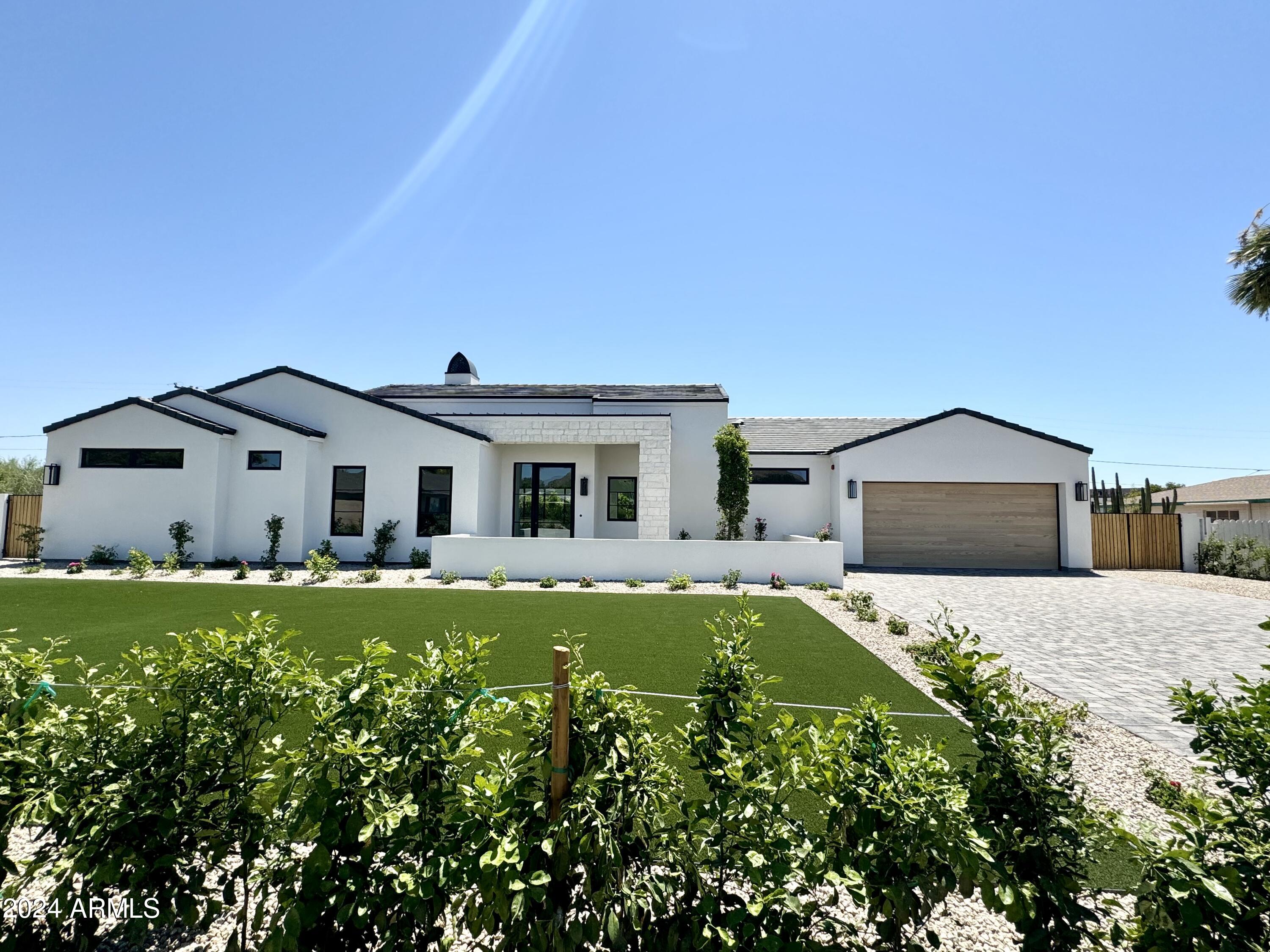 Just finished, beautiful  brand new build on large lot in the absolute best Paradise Valley location, with full  and direct CAMELBACK MOUNTAIN VIEWS. Modern design with excellent high end finishes, Wolff ,Subzero Appliances, butler pantry. Separate office with mountain views One level throughout no steps . Walk to Fashion Square, shopping, movies, restaurants, Lifetime Gym this is the close to everything great location you've been waiting for tucked into a quiet neighborhood. Heated pool and spa, lock and leave low maintenance yard. This high end new home was built with 2x6 walls, foam insulation, tile and steel roofing for low utility costs. Best of all NO HOA.