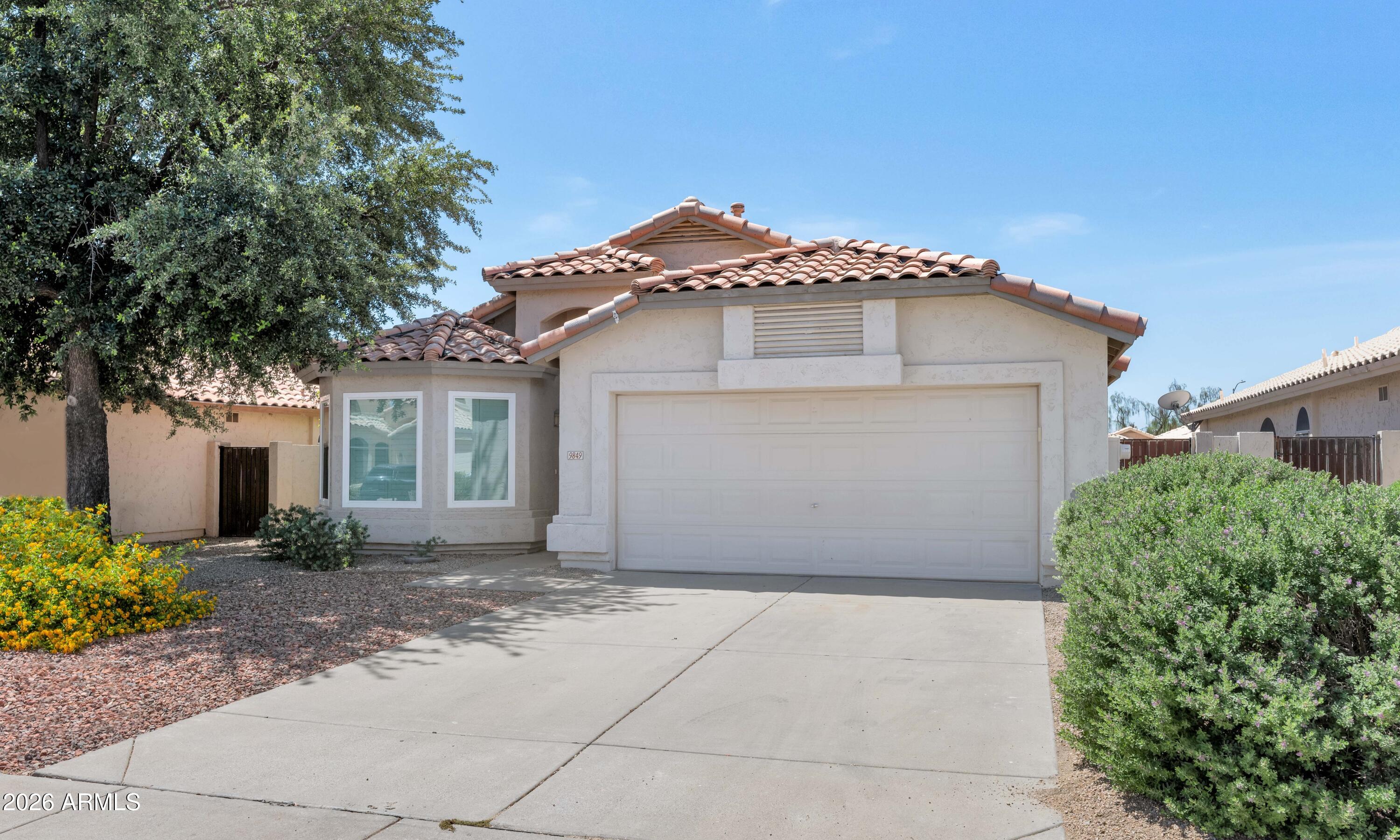 Beautifully maintained 3-bedroom, 2-bath home in Parkridge that shows like a model! Prime location within walking distance to Parkridge Elementary and nearby parks, with easy access to Loop 101 and Arrowhead amenities. Open floor plan features vaulted ceilings, formal living and dining areas, and a spacious island kitchen that flows into the family room. Oversized primary suite includes a walk-in closet and newly remodeled walk-in shower with private patio access. Brand-new windows and newer A/C add comfort and efficiency. Tile flooring in high-traffic areas. Built-in storage cabinets in garage and laundry room. Low-maintenance landscaping--move-in ready!