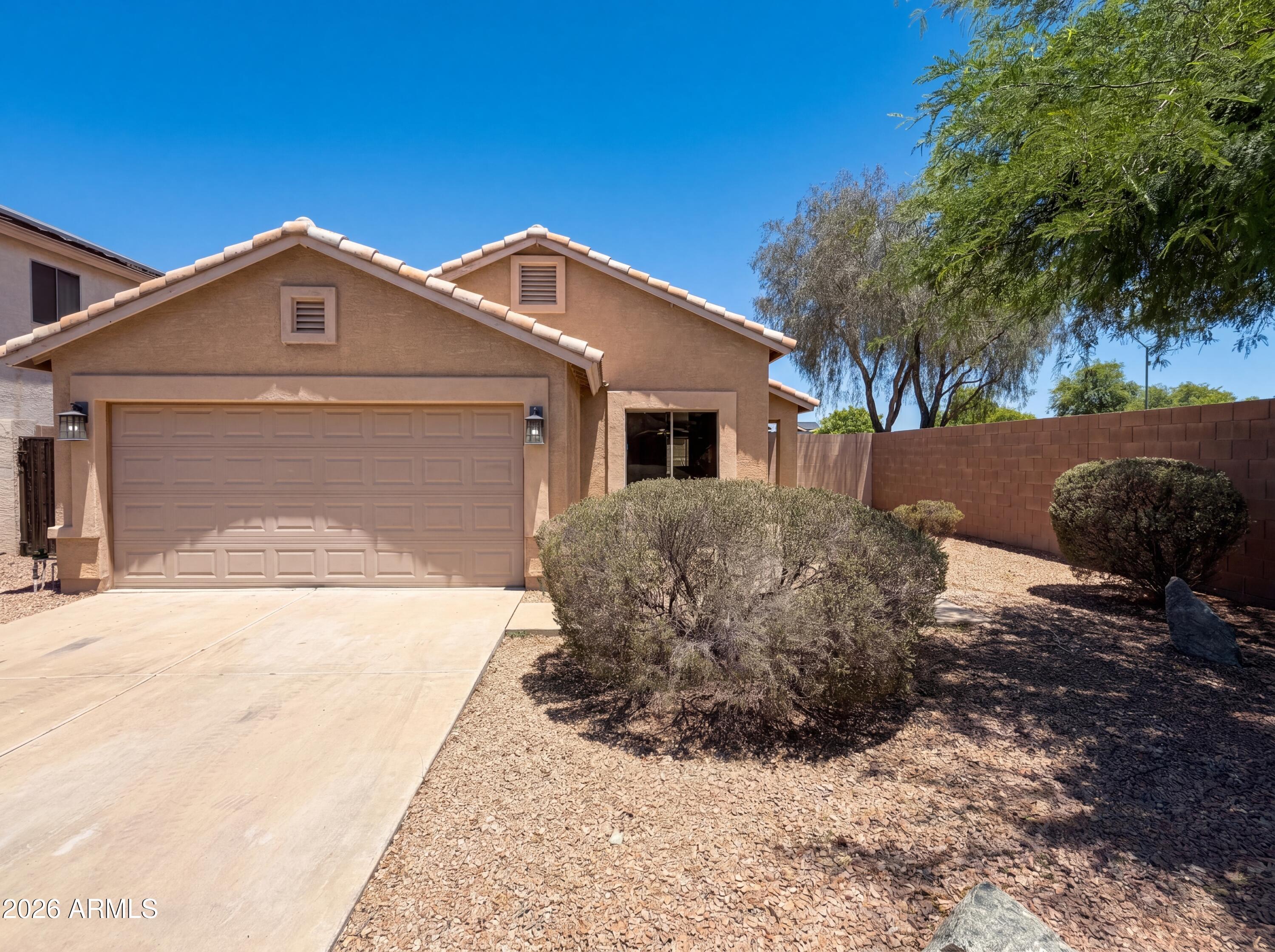 Meet 13702 W Marissa Dr, a residence includes a fresh interior paint and partial flooring replacement. A stainless steel appliances equip the kitchen, while the primary bedroom features a walk in closet and a primary bathroom with a jacuzzi tub. Enjoy a covered patio, fenced in backyard, and low maintenance landscaping. Experience comfort and modern updates in one functional space.. Included 100-Day Home Warranty with buyer activation