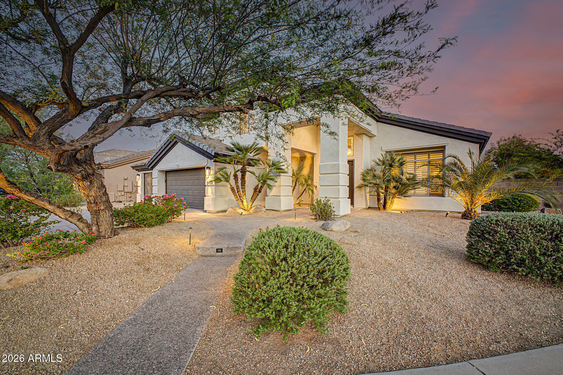 Location, Location, Location.  This beautiful home is located in a highly desirable location of Kierland in Scottsdale.  World class shopping, resort, golf and restaurants are just minutes away. .  You will see the pride of ownership both inside and outside of this home.  Once you arrive you are welcomed with a beautiful entry with towering ceilings and open floor plan. Ceramic wood tile throughout the ground floor.   This home has a number of remodeled and updated items.  Please see the many updates in the document tab.