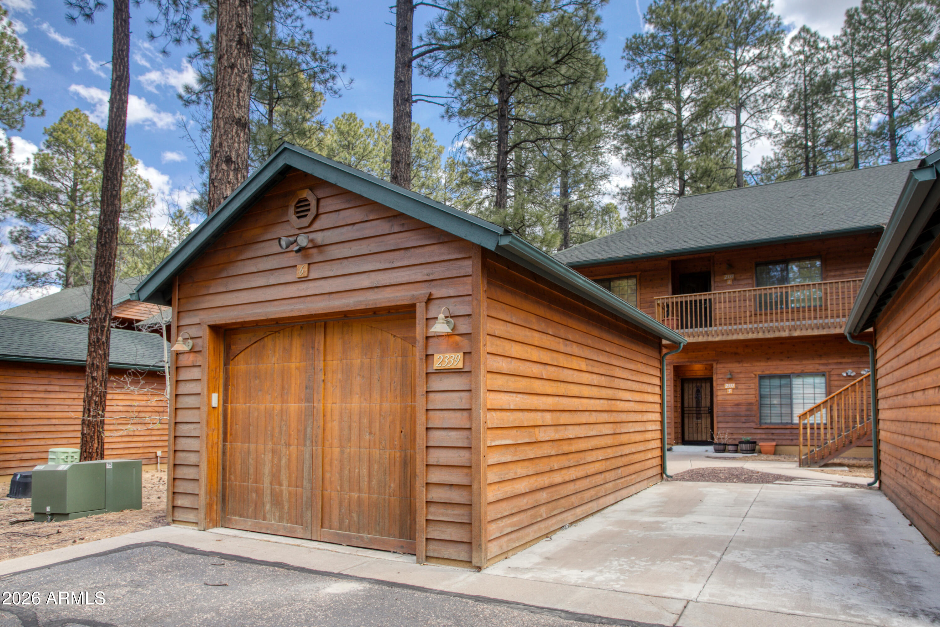 Nestled among towering Ponderosa pines in the highly sought-after Pinetop Country Club community, this exceptional fully furnished mountain retreat captures everything people love about life in Arizona's White Mountains. Backing to a peaceful, tree-lined common area, the home offers the perfect balance of comfort, privacy, and effortless mountain charm, where cool summer temperatures, fresh pine-scented air, and endless outdoor recreation become part of everyday living. Inside, the beautifully designed 3-bedroom, 2-bath townhome welcomes you with a spacious open layout, soaring vaulted ceilings with custom bamboo accents, and a stunning floor-to-ceiling stone gas fireplace that creates a warm and inviting gathering space. Thoughtfully curated furnishings and quality finishes throughout make this residence completely turnkey and ready to enjoy from day one. The open-concept kitchen is ideal for gathering with family and friends, offering abundant cabinetry, generous prep space, stainless steel appliances, and seamless flow into the living and dining areas. Warm wood laminate flooring throughout creates a refined, low-maintenance mountain aesthetic with no carpet.
The split floor plan provides privacy, with a spacious primary suite overlooking the peaceful forest setting, complete with a large walk-in closet and spa-inspired bath with dual vanities. Guest accommodations are thoughtfully designed, including a flexible bedroom with built-in workspace and additional sleeping options for visitors. A spacious pantry, well-appointed laundry room, and oversized 1-car garage with additional parking add convenience and functionality.

Step outside onto the private deck and experience the true magic of mountain living. Sip your morning coffee beneath towering pines, enjoy cool summer evenings with friends, or simply relax and take in the crisp mountain air and peaceful surroundings. Offered fully furnished, including all interior furnishings, décor, garage items, and 3 TVs, this truly turnkey property is ready to enjoy immediately as a full-time residence, vacation retreat, or investment opportunity.

Located in the desirable Pinetop Country Club area, residents enjoy access to an incredible mountain lifestyle. Nearby are 3 golf courses, including 1 public and 2 private courses, along with tennis and pickleball just down the street. Beyond the fairways, the White Mountains offer endless year-round recreation and small-town charm. Spend your days hiking scenic forest trails, fishing and boating on nearby lakes, skiing in the winter, or exploring miles of beautiful mountain terrain.

The surrounding communities of Pinetop, Lakeside, and Show Low are known for their vibrant seasonal events and welcoming atmosphere, featuring farmers markets, art festivals, rodeos, classic car shows, concerts, carnivals, and holiday celebrations throughout the year. Enjoy boutique shopping, cozy coffee shops, local breweries and wineries, spas, and excellent dining options all within minutes. Families and visitors alike will appreciate the parks, playgrounds, and countless outdoor activities that make the White Mountains one of Arizona's most beloved destinations.
Whether you're spending the afternoon on the golf course, enjoying cool summer temperatures on the deck, attending local mountain festivals, or creating lifelong memories with family and friends, this exceptional home offers more than just a property, it offers the unmatched White Mountains lifestyle.

***

Discover the White Mountains of Arizona--where adventure, beauty, and fresh mountain air come together. Enjoy four stunning seasons, 40 lakes, and 600+ miles of rivers and streams, perfect for fishing, kayaking, and exploring.

Hit the trails on one of the largest trail systems in the Southwest, or spend winter days at Sunrise Ski Resort, just 40 minutes away with three mountains of skiing, snowboarding, and sledding.

Love shopping or culture; wander through antique shops, summer arts & craft fairs, and lively music festivals. Golfers can tee off at seven scenic courses, including three public gems.

It's no wonder Pinetop-Lakeside was voted the "Best Cabin Region in the U.S."

The White Mountains--Arizona's best-kept secret. Come explore and embrace the MAGIC!