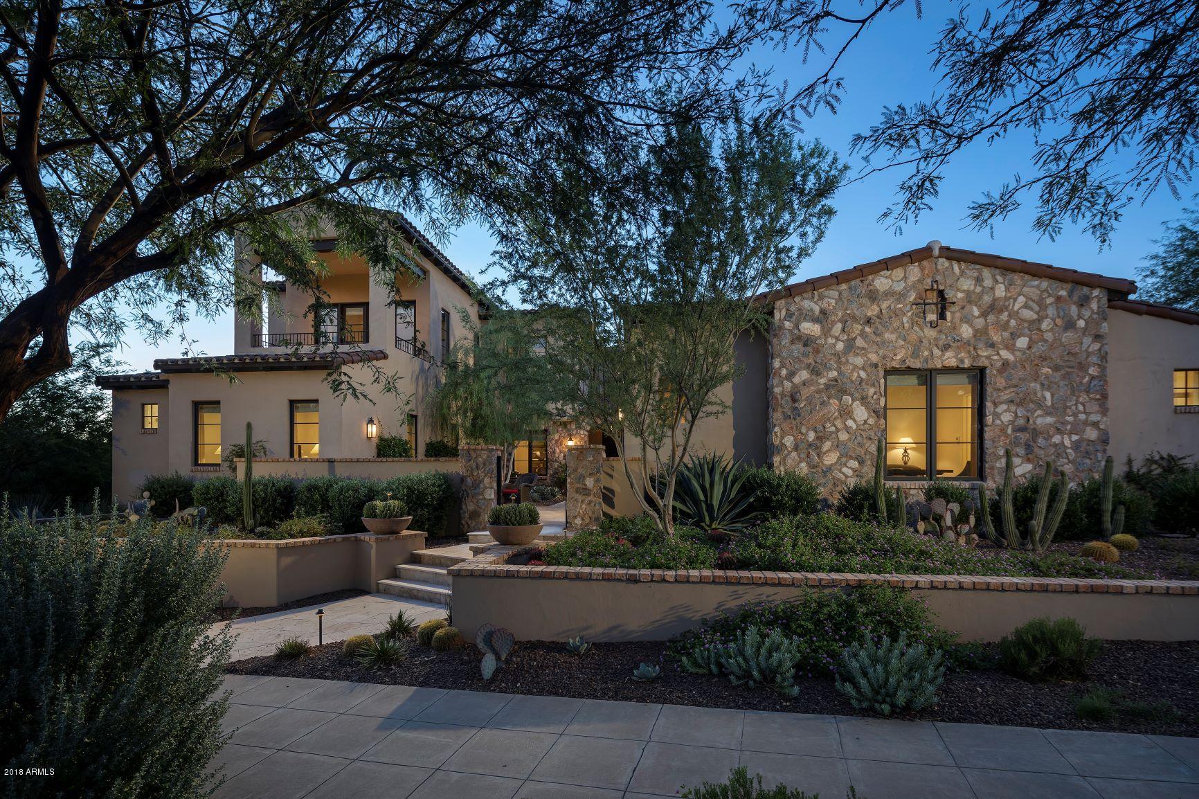 Don't miss this ''jewel box'' custom home designed and built by Calvis Wyant Luxury Homes. This 5,154 square foot home has 5 bedrooms (including separate guest casita), 6 bathrooms, plus den/office and bonus/media room. The home boasts the lushest of landscaping, privacy and a high finish level, with a charming Spanish exterior, open great room floor plan, and a refined, sophisticated feel. The home is in close proximity to three of the beautiful parks that make the Windgate Pass Parks neighborhood in Silverleaf so charming and desirable.