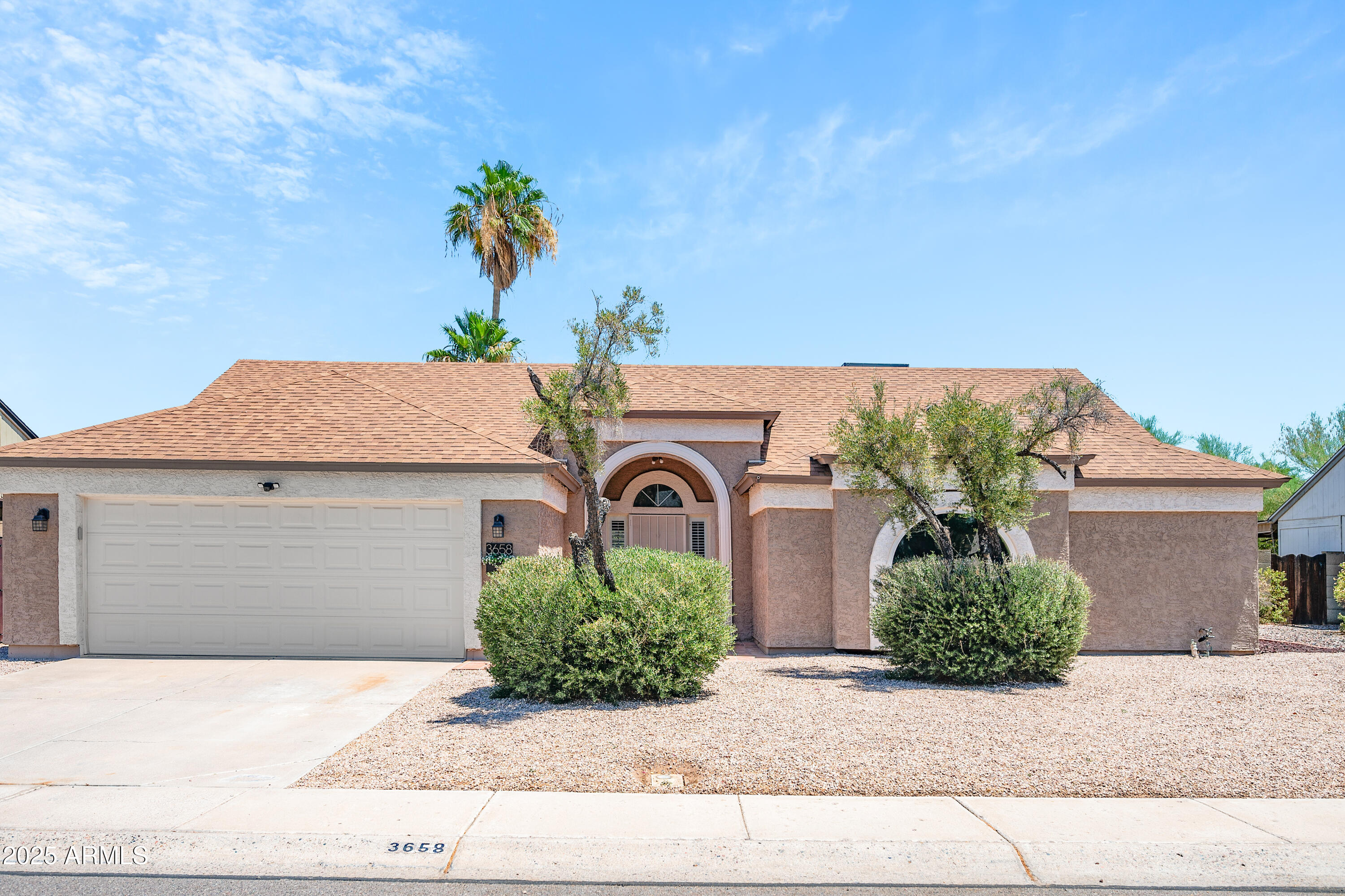 Welcome to this beautifully maintained 3-bedroom, 2-bathroom home in the heart of Chandler--with NO HOA! Ideally located just minutes from the 101, 202, and I-10, within walking distance to Chandler Fashion Center, and only 15 minutes from Sky Harbor Airport, this home offers both convenience and comfort. Enjoy easy access to shopping, dining, and entertainment right at your doorstep. Inside you will find an inviting open floor plan featuring vaulted ceilings, tile flooring, and a rare fireplace. The chef's kitchen is a dream, boasting custom cabinets with crown molding, granite countertops and backsplash, recessed lighting, a wall oven, a spacious pantry, and an oversized island--perfect for entertaining! The primary suite offers a private entrance to the resort-style backyard