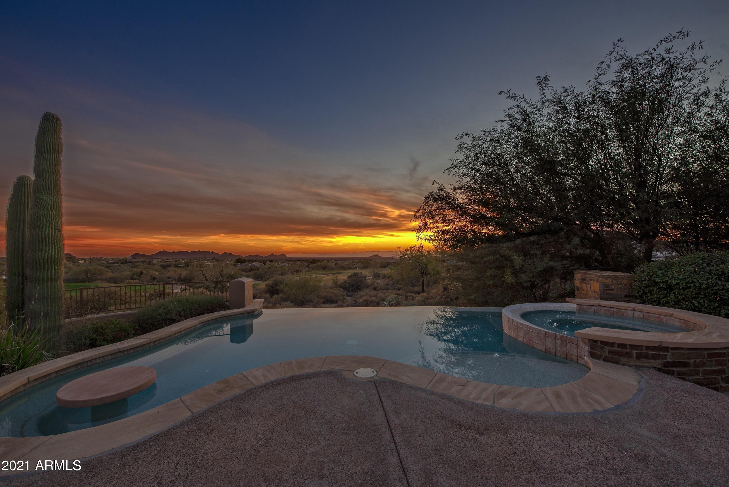 This wonderful home showcases views of the third green of the Chiricahua golf course and 4800 square feet of luxurious living all on one level. The spacious great room features a custom built-in entertainment center, stone fireplace and wet-bar. Fine finishes include travertine floors, granite counter tops, alder wood cabinetry and doors, large beam ceiling treatments and custom built-ins. Resort like back yard has pebble-tec pool and spa with bar table, fire pit with seating, built-in barbeque and expansive views of the valley.