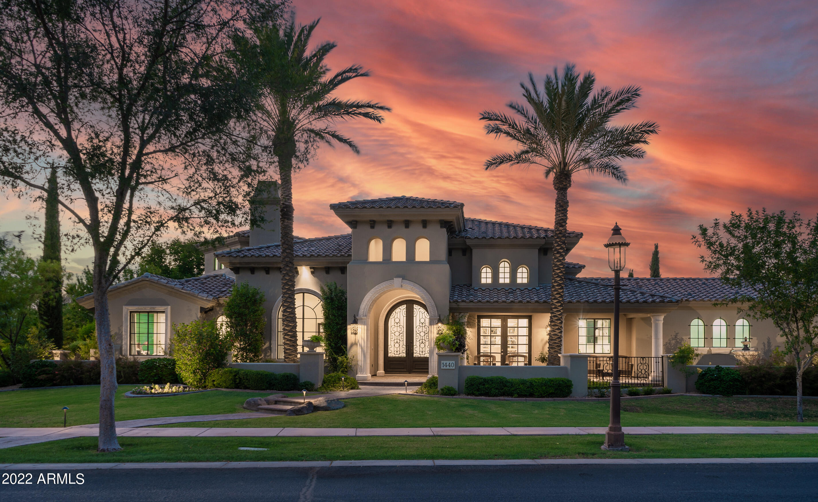 This is an amazing custom luxury home with everything you could want. This 6 bed 5 bath custom home in Legacy! Your entry into this new world of elegance and luxury is made all the more memorable by merging contemporary amenities, elaborate details and finishes set off in a backdrop of dramatic spaces thoughtfully integrating indoor and outdoor living. Hold that all together with a professional-grade kitchen boasting Wolf cooktops, double ovens, breakfast nook, and large kitchen island. Take indoor entertainment to the next level with a downstairs game area, kitchenette and theater area w/ walk out basement. Basement includes 2 bedroom, 1 bath, rec rome/game room and bonus room that could be converted into another bedroom. As you enter the home you have to look up to see the amazing woodwork on each ceiling.  Incredible grounds w/ large grass area, entertainer's patio w/tongue & groove wood ceiling, built in BBQ & pool & spa. Oversized 4 car garage. Community has a large grass area, tennis court, basketball court and covered ramada.