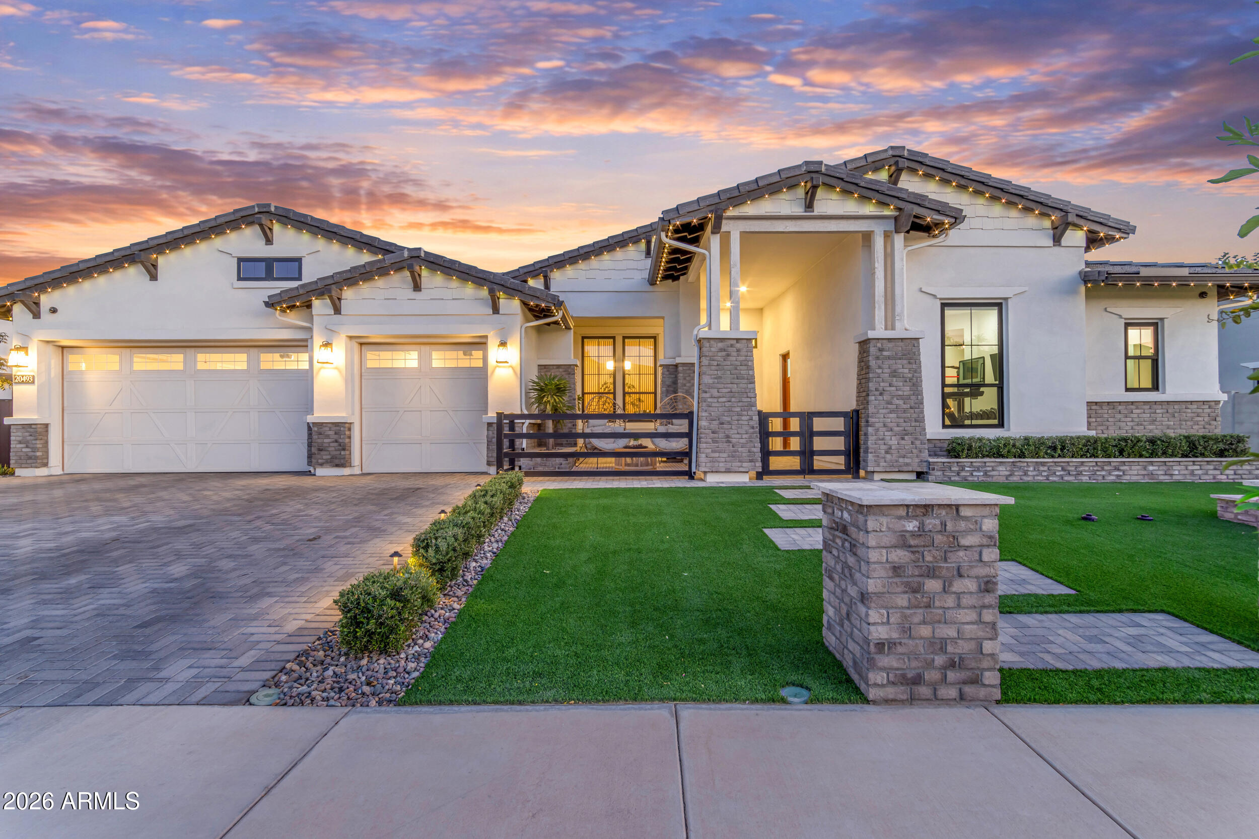 Welcome Home! Located in the coveted and highly sought-after Bridle Ranch community, this exceptional Toll Brothers-built Queen Creek estate offers a rare blend of privacy, scale, craftsmanship, and resort-style living. Set on one of the neighborhood's few half-acre lots, the property captures beautiful mountain views while delivering an elevated indoor-outdoor lifestyle designed for both grand entertaining and everyday comfort.

From the moment you arrive, the home makes a statement with impressive curb appeal, thoughtfully designed front and backyard landscaping, permanent exterior lighting, and premium oversized lot positioning. Inside, soaring 12-foot ceilings in the living room, piano area, and entryway create an immediate sense of volume, elegance, and architectural presence. The interior has been extensively upgraded with custom finishes and elevated details throughout. The gourmet kitchen is a showpiece, featuring a custom-built iron hood, commercial-grade oven and cooktop, upgraded cabinet lighting, a farmhouse sink, and refined finishes designed for both everyday living and effortless entertaining. Additional upgrades include glass iron doors for the den, pantry, and laundry room, a built-in hutch bed in the guest bedroom, epoxy garage flooring, and a thoughtfully designed attached casita that can function beautifully as a private gym, executive workspace, guest retreat, or separate living quarters.

The backyard is a true private oasis. Designed on a grand scale, it features a spectacular 75,000-gallon pool, a massive jacuzzi with room for 25+ people, lush landscaping, backyard misting and fogging systems, two large pergolas with swinging chairs and a swinging couch for ultimate comfort, Built in BBQ, flat top grill AND a 16-speaker Sonos in-ground sound system with two subwoofers. Altogether, the outdoor living space creates an unforgettable setting for entertaining, relaxing, and enjoying Arizona's iconic sunsets!

With over $1,250,000 in documented upgrades and premium improvements, this property represents a rare opportunity to own one of Bridle Ranch's most impressive homes, combining luxury, technology, outdoor living, and an irreplaceable lot in one unforgettable package.

Perfectly positioned right across the street from Pecan Lake and the Queen Creek Equestrian Center, this home offers a lifestyle as exceptional as the property itself. Enjoy immediate access to some of Queen Creek's most beloved outdoor and equestrian destinations, while being just minutes from local shopping, hiking, golf, dining, and entertainment.