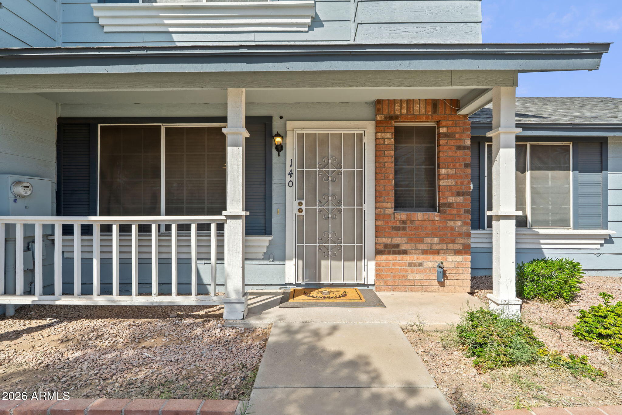Welcome to this charming 2-story townhouse in the highly desirable Castle Rock community, surrounded by mature trees and beautifully maintained common grounds. Perfect for first-time buyers, this home offers a low-maintenance lifestyle with HOA-covered landscaping and a private patio yard to enjoy. Ideally located near top Peoria schools, shopping, dining, and easy freeway access. Inside you'll find a spacious living room with tile entry, a formal dining area with tile flooring, and a light, bright kitchen with plenty of oak cabinetry and generous counter space. Upstairs features two large bedrooms and two full bathrooms. The primary suite offers dual sinks and a large garden tub. Downstairs includes a convenient half bath and laundry. Big upgrades include a NEW AC and NEW ROOF!