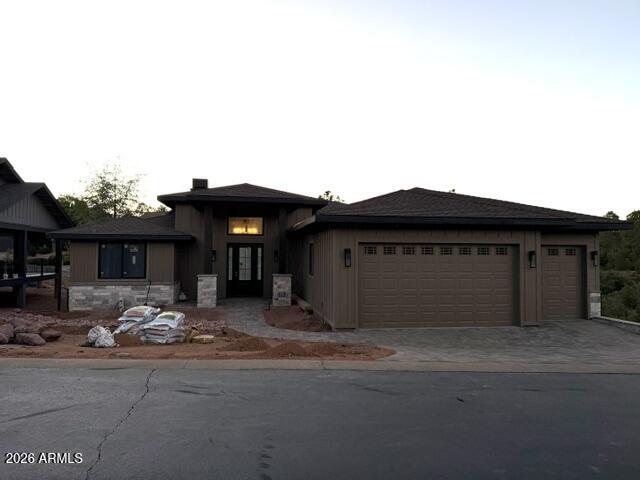 Almost ready to move in!  Another gorgeous Hughes Construction custom home!  Designer touches throughout this home include beams in great room, stone gas fireplace, custom ceiling in entry, custom hood in kitchen, arched primary shower, arched custom shelf over primary vanity, arched shelving unit in hall.   Gorgeous cabinets and tile kitchen, baths and laundry. LVP throughout - yes no carpet!!   Tons of storage in the walk in pantry and large laundry with sink.   Deck runs the entire back of the home for you to enjoy the cooler mountain temps!  3 car garage.  Chaparral Pines has tons of amenities for the whole family.   Golf memberships available from Arcis.   Trailhead fee of $330 per month required of owners plus a one time fee of $7500 with purchase. Ready to move in by mid-July.