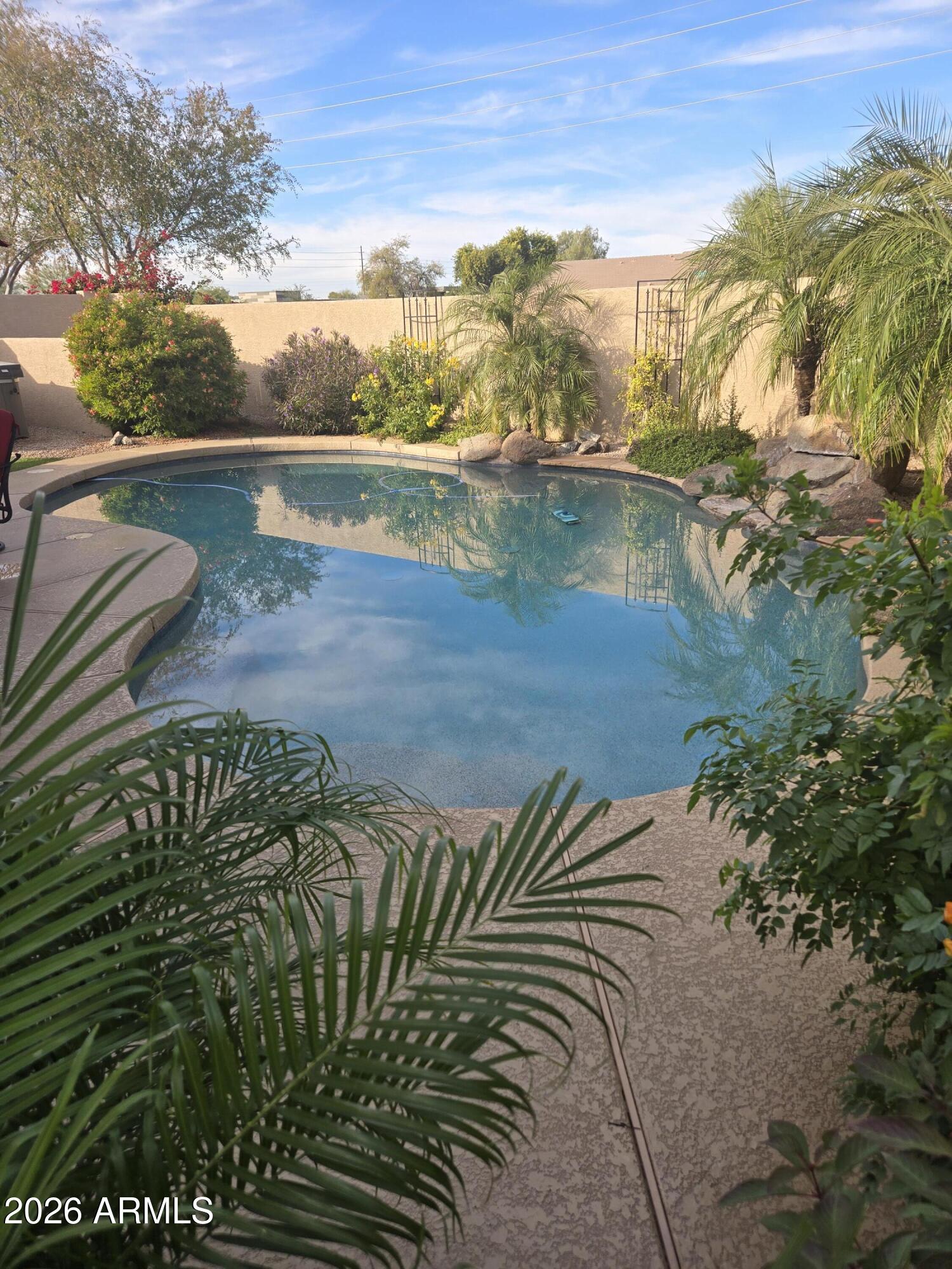 3 CAR GARAGE WITH AMAZING TROPICAL BACKYARD AND POOL. 3 BEDROOMS, 2 FULL BATHS WITH GRANITE, SEPERATE TUB/SHOWER. UPGRADED KITCHEN APPLIANCES, CENTER ISLAND. FORMAL LIVING/DINING COMBO & FAMILY ROOM. GARAGE IS EPOXY COATED WITH SEPERATE WALK IN CLOSET. R/O. SOFT WATER. COMES WITH REFRIGERATOR, WASHER & DRYER.