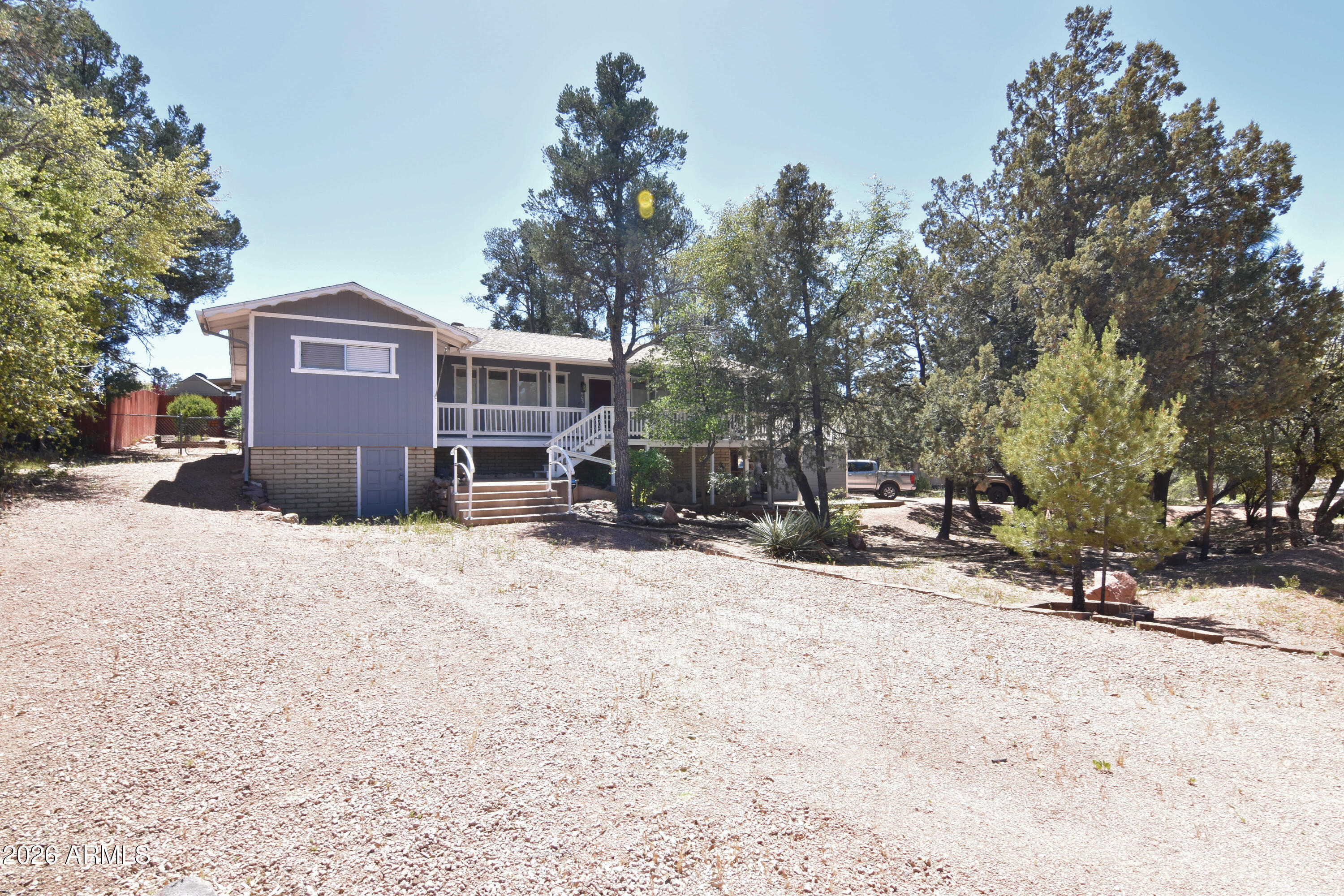 Charming Payson Retreat on Spacious Lot!
Discover this cozy 2 bedroom, 2 bathroom home nestled on a generous 0.27-acre lot in the heart of Payson. Offering a peaceful, cottage-style setting surrounded by mature trees, this property provides the perfect blend of privacy and convenience. Inside, you'll find a functional split floorplan with abundant natural light, a spacious living area, and an inviting kitchen complete with ample storage and a walk-in pantry. Laminate flooring throughout and inside laundry add to the home's comfort and practicality. Step outside to enjoy the large, covered porch and elevated deck--ideal for relaxing and taking in beautiful mountain views and Arizona sunsets. The fully fenced backyard offers space for pets, gardening, or entertaining, along with additional storage/workshop space and covered parking. With no HOA, room for RV parking, and a quiet neighborhood location just minutes from local shops and dining, this property is perfect as a full-time residence, weekend getaway, or investment opportunity.