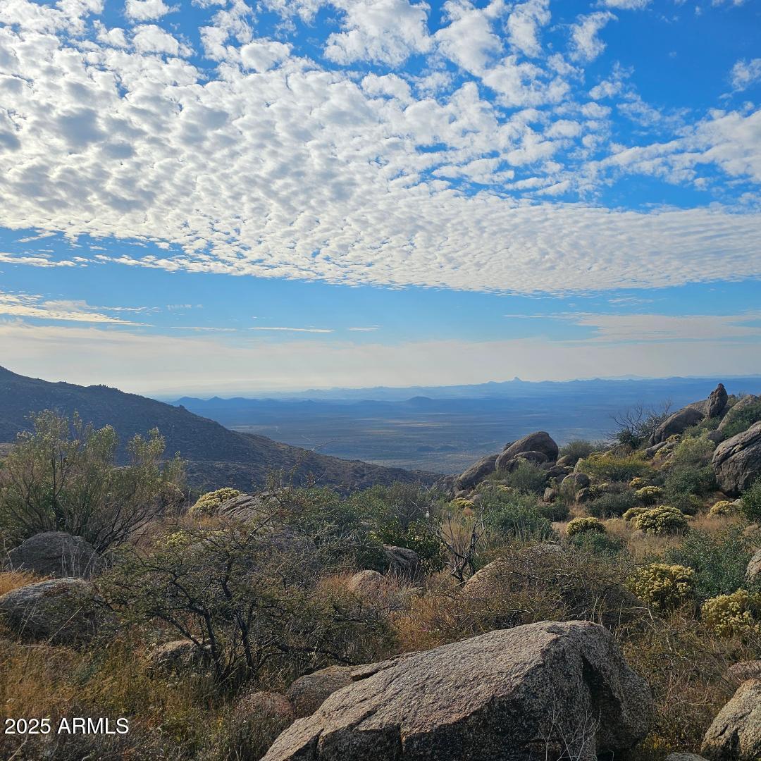 Come take a look at this beautiful land. This is your chance to purchase 8.46 acres and build your dream home. Lots of possibilities. Lots of privacy.  Peaceful and quiet. CCRs in place for site built only. Build your home, casita, shop, horse set up or whatever else your heart desires. Live off grid or hookup to APS in the area. Lots of high desert beauty. An abundance of boulders in the area. Easy access to Hwy 89 to head to Prescott or head down the hill to Wickenburg. Enjoy the quiet little town of Yarnell. Quaint diners and unique boutiques. Make this your weekend getaway or full time residence. Come take a look. Additional parcel is available to purchase 38.08 acres. Combine the 2 for a total of 46.54 acres. MLS #6889936. 2 separate owners. DON'T MISS OUT!!!