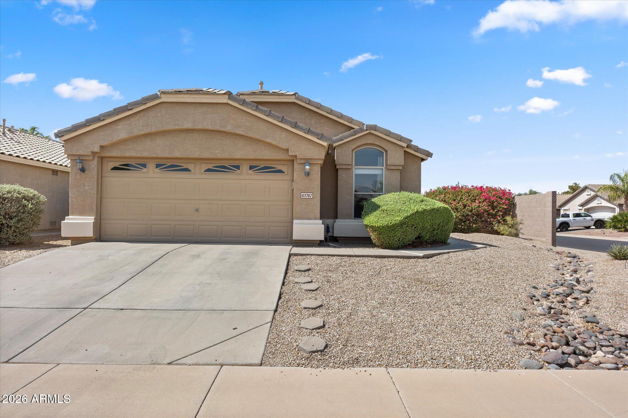Beautifully maintained single-level home in the highly desirable community of Rancho El Dorado! This property offers a bright, open layout with spacious living areas, neutral finishes, and great natural light throughout. The kitchen features ample cabinetry, a large breakfast bar, and direct flow into the dining and great room area. The primary suite provides a comfortable retreat with a generous bedroom, walk-in closet, and full bath with separate shower/tub. Split floorplan bedrooms are nicely sized and ideal for guests, family, or a home office setup. Private backyard with a covered patio and plenty of room to design your ideal outdoor space. The home sits in a quiet neighborhood just minutes from The Duke Golf Course, parks, lakes, shopping, dining, and Maricopa's growing amenities.