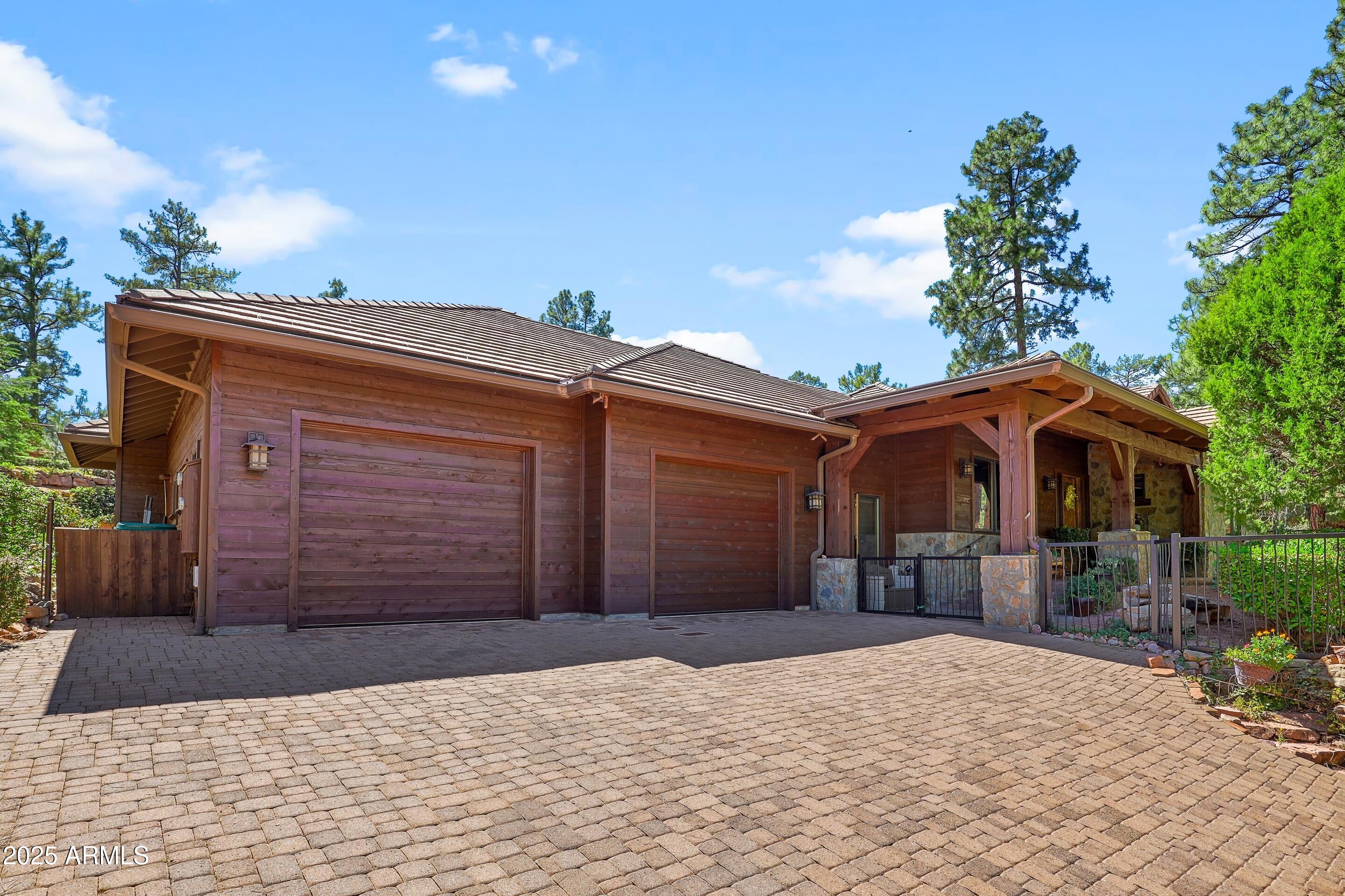 SELLER OFFERING MEMBERSHIP & DUES  INCENTIVE! Single-Level with Golf Course View.
3-bedroom, 3-bath freshly painted residence combines elegance, comfort, and efficiency in a serene setting. Upon entering, massive beams and a welcoming stone fireplace set the tone for this thoughtfully designed home.
The kitchen features granite countertops, an island, and a unique mountain silhouette backsplash--perfect for both cooking and entertaining. A split floor plan offers privacy, with the primary suite showcasing double closets and a spa-like bath. Hardwood floors flow throughout, while the separate office provides inspiring views of the 14th green, also enjoyed from the dining room. Large 2.5 car garage. Step outside to a lush, garden-like backyard, ideal for relaxation as you enjoy the many colors, plus there is room for gardening. A recently added owned solar system keeps utility costs low, while the large driveway offers ample parking for guests. Quietly nestled in a prime location, this home blends golf course living with mountain charm.