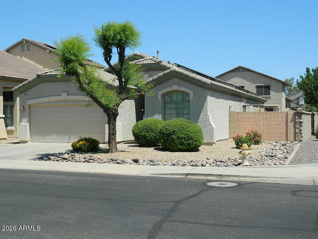 Exceptional resort style 3-bedroom, 2-bathroom, den home loaded with all options and upgrades imaginable. You cannot build a new house with all the options for this price point! You cannot buy a home and add all these options for the listed price. 100% wood look tile plank floors, oversized jacuzzi soaking tub in the master bathroom, vaulted ceilings, on demand gas hot water, high end water softener, garage storage cabinets, stainless appliances, granite counters, large, screened Arizona room, outdoor putting green, large stainless BBQ island, Beehive gas outdoor fireplace by the pebble tech pool and spa with in floor cleaning systems. 100% paid for solar panel system conveys to the new owner, additional security cameras & Ring doorbell system also convey.
Notice the plantation shutters.