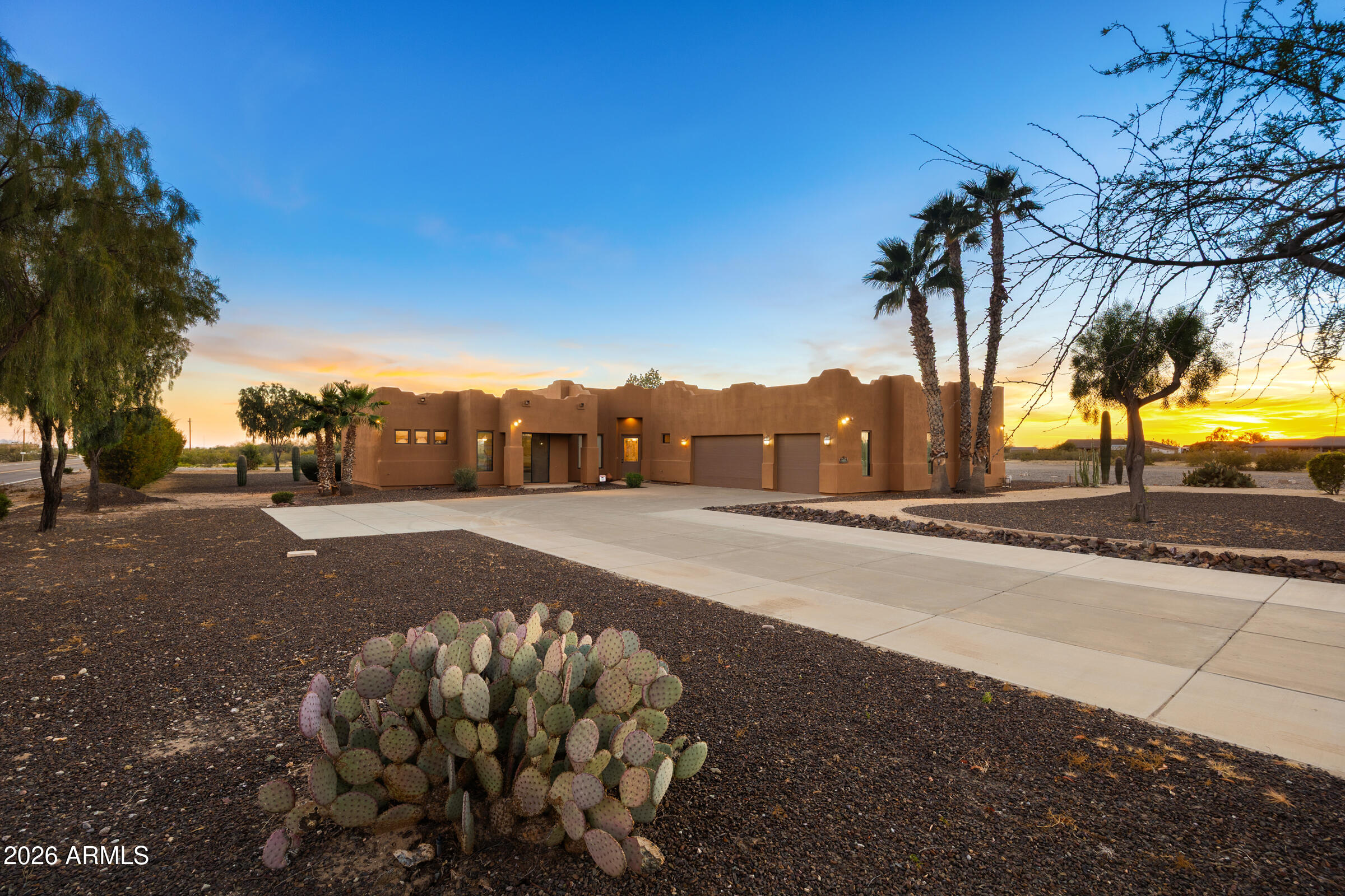 Set on over 7 acres across five separate parcels, this rare horse property in Surprise offers both an exceptional equestrian lifestyle and a compelling future redevelopment opportunity. Directly adjacent to new-build communities and surrounded by other horse properties, the location provides a unique blend of privacy, open land, and long-term upside.

This residence features an electric fireplace, an oversized garage, and a rooftop deck ideal for taking in desert sunsets and panoramic surroundings. The property is fully equipped for equestrian use with a horse arena, stables, and RV hookup, along with a custom detached tack room offering excellent flexibility for equipment and hobbies. Whether you're an owner-user seeking space for horses and toys, or an investor looking to capitalize on a growing corridor, this property presents a rare opportunity to secure acreage in a rapidly growing area while enjoying immediate functionality and future potential.