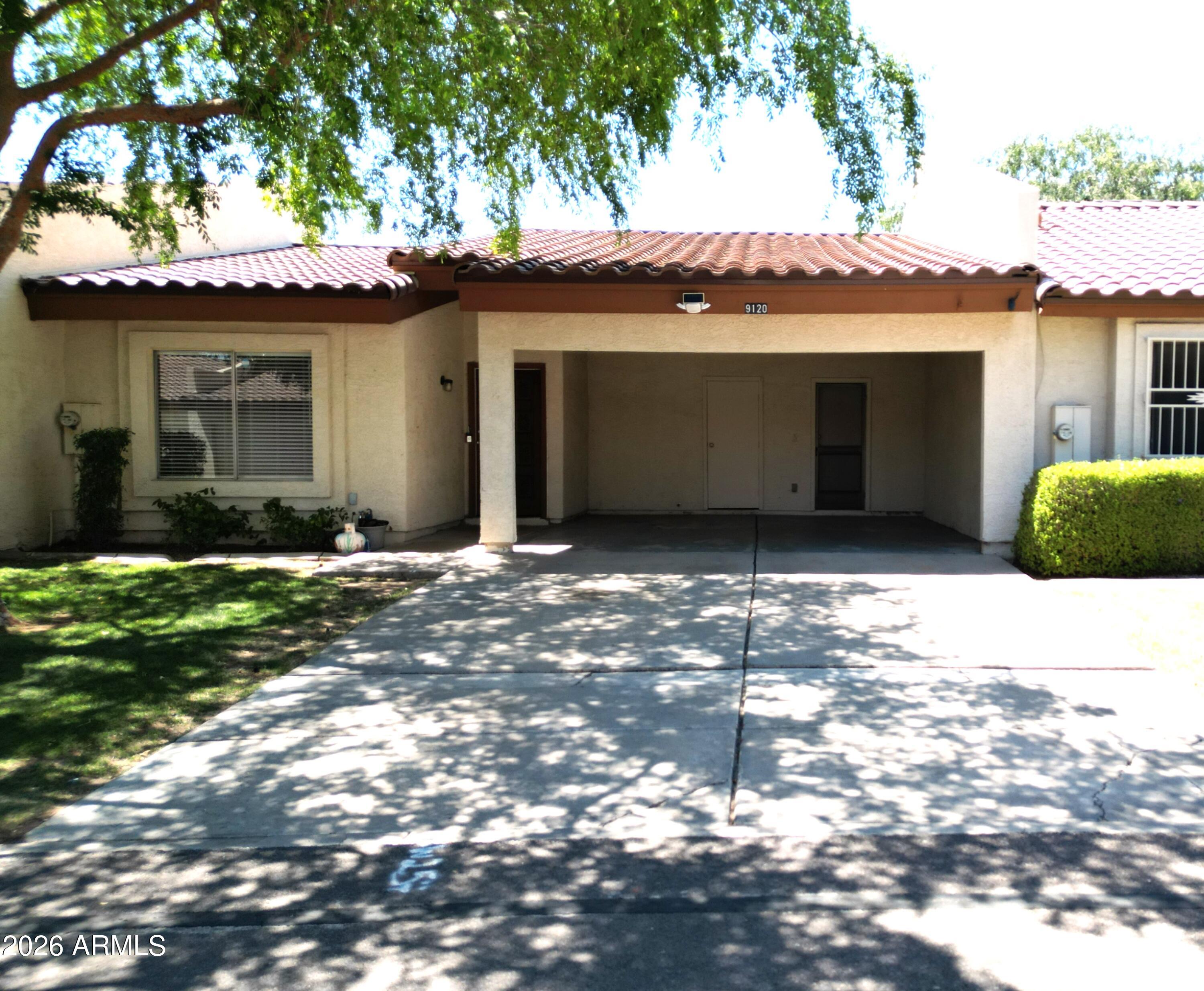 Welcome to this updated single-story townhome in Peoria! This 2 bed, 2 bath home features stylish vinyl flooring, vaulted ceilings, modern cabinetry, and granite countertops. Both bathrooms have been upgraded with contemporary finishes. Enjoy a low-maintenance backyard, perfect for relaxing evenings, plus a convenient 2-car carport. The community offers a refreshing pool, and the central location provides quick access to highways, schools, shopping, and dining. A great opportunity for comfortable, easy living in a prime area!