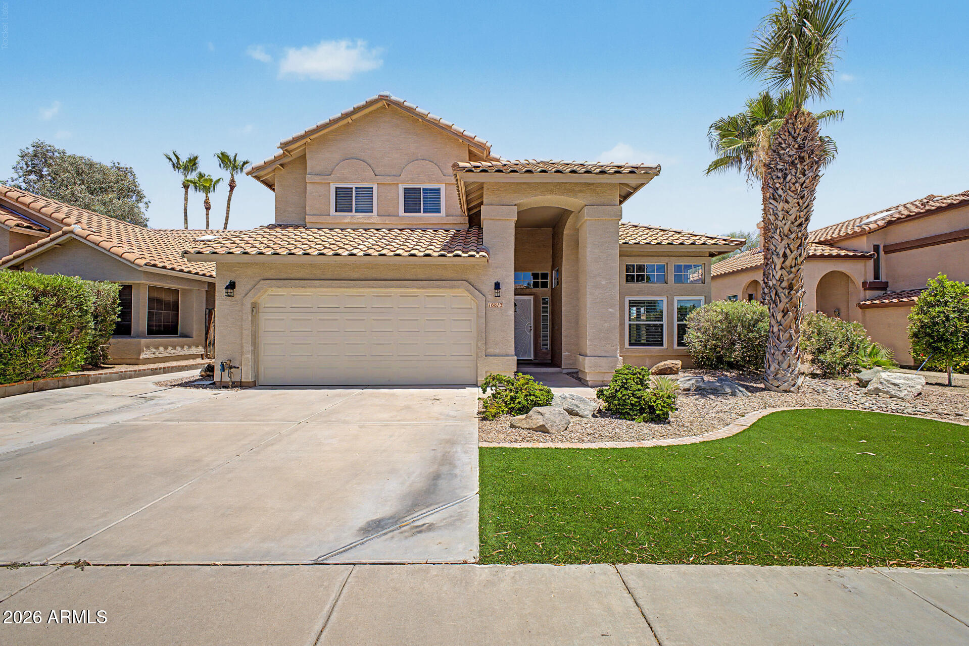 Spacious and thoughtfully designed, this two-story home offers generous living areas and well-sized bedrooms throughout. Upon entry, you're welcomed by a large front living room filled with natural light from an abundance of windows. The heart of the home features an open-concept kitchen and living space, creating a comfortable setting for everyday living and entertaining. All bedrooms offer ample space, providing flexibility for a variety of needs, while updated bathrooms bring a clean, modern feel to the home. Step outside to enjoy the backyard retreat, complete with a pool, waterfall feature, and outdoor shower. Perfect for relaxing or enjoying Arizona's outdoor lifestyle. Located in Lakewood, one of Phoenix's most desirable communities, this home is close to high