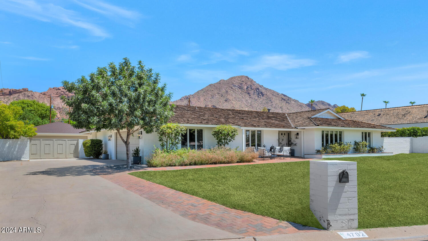This darling cottage style home is what everyone in Arcadia is looking for. It's been completely remodeled so it's impressive as is, yet it sits on a fantastic lot and has endless potential. The eat-in island kitchen is beautiful, there are both formal and informal dining areas, the family room is spacious and warm, the den is beaming with natural sunlight and all the bedrooms and baths are just great. Built-in cabinetry, wood flooring, designer lighting and oversized picture windows add character to every space, and the yard is amazing with a meandering brick deck, built-in barbecue, pizza oven, fireplace, lap pool, overhead string lighting and spectacular mountain views. It even has a 4-car garage. This fantastic residence is located on an exceptional street in the heart of Arcadia and is perfect for a single, a growing family, empty nesters or someone wanting to create something very special on an outstanding lot!