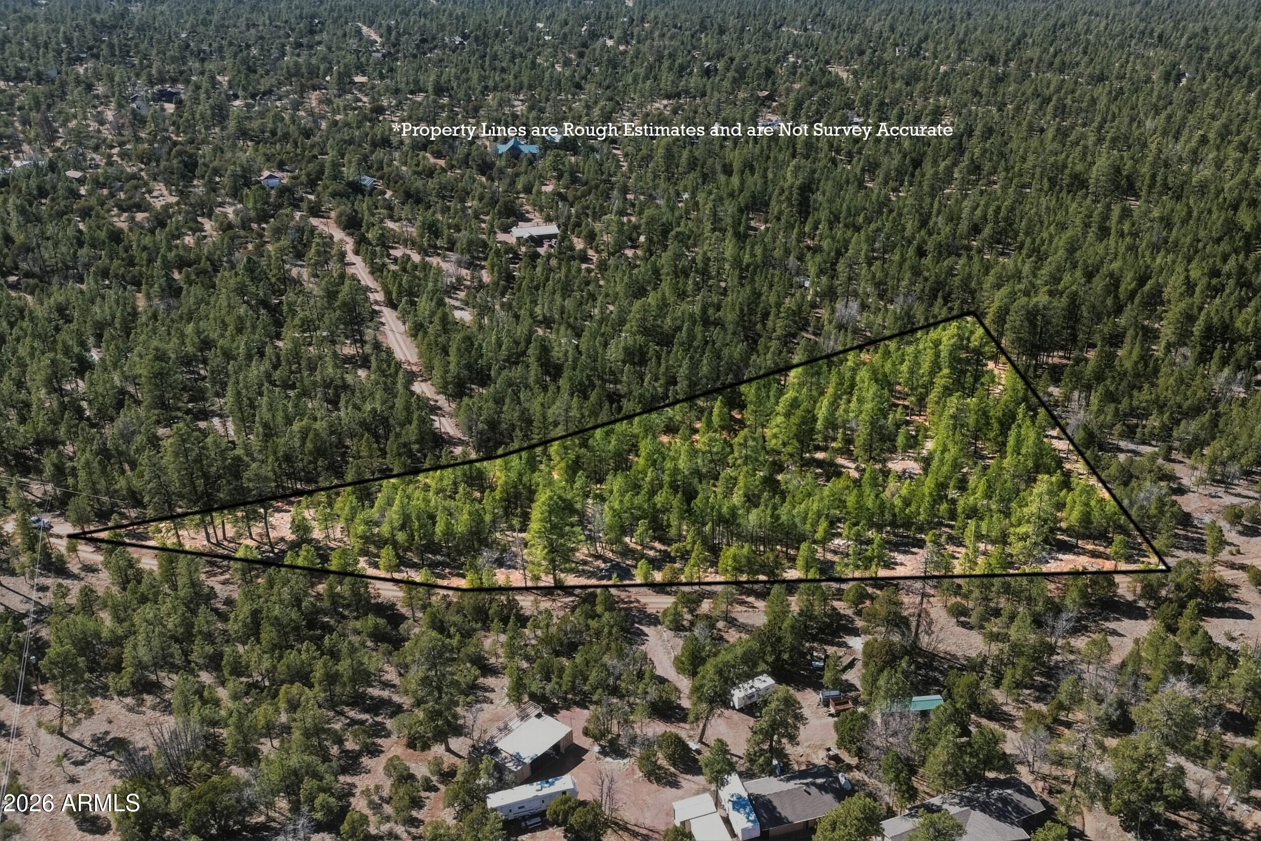 NON HOA 4 ACRES- Lot has great trees, access from Wigeon or Spoonbill. Well has access to 1/5 of well, water will be run to it before close of escow.  Need to install septic and electric.  RVS or Manufactured homes allowed.  4 acres gives endless potential don't miss out this great lot in Ponderosa Pines. Easy acccess to forest. Horses, chickens, etc okay.  This is a rare opportunity to own land in this subdivision.